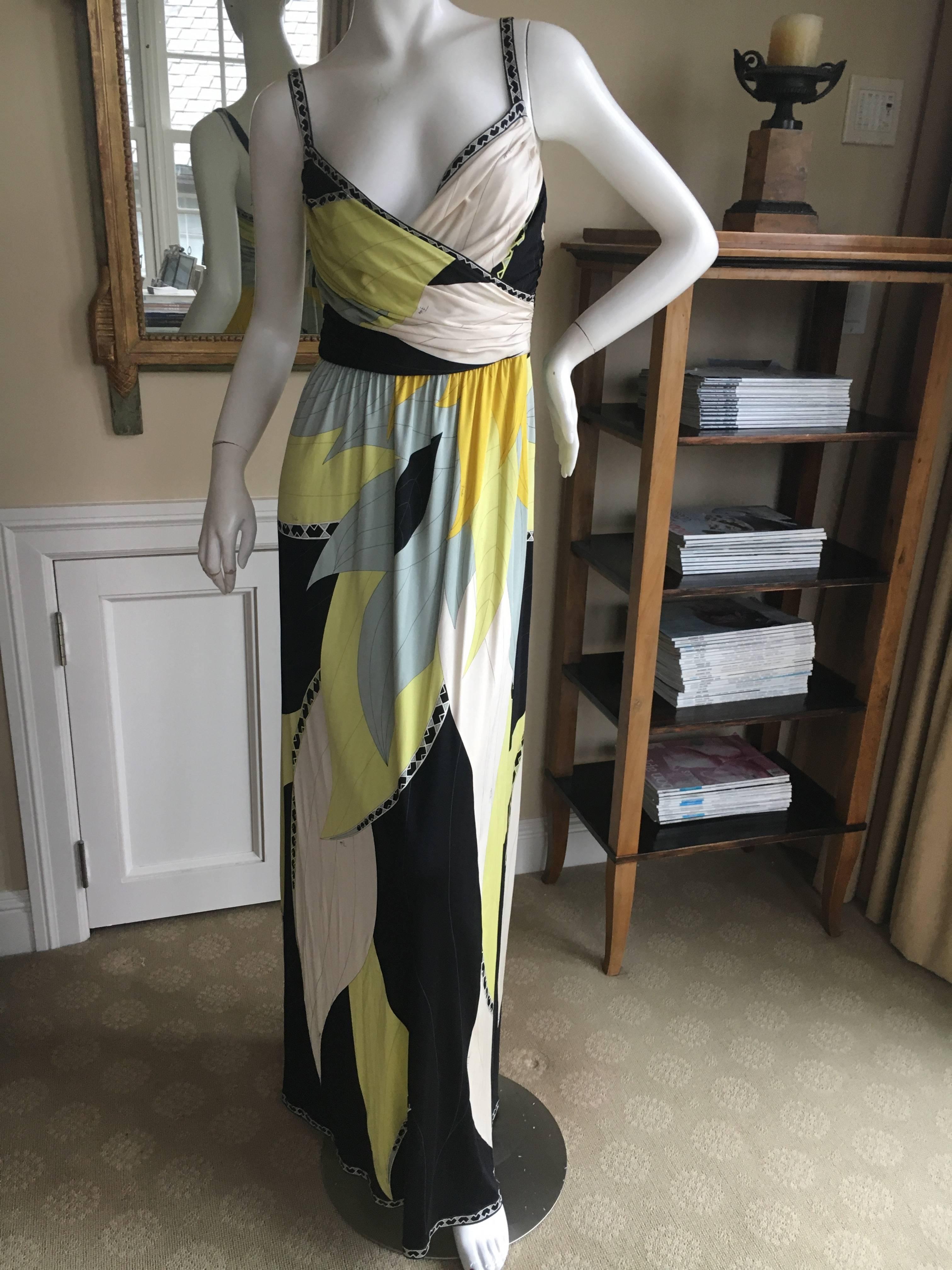 Beautiful silk evening dress from Emilio Pucci.
It is New with tags size 36
Bust 36