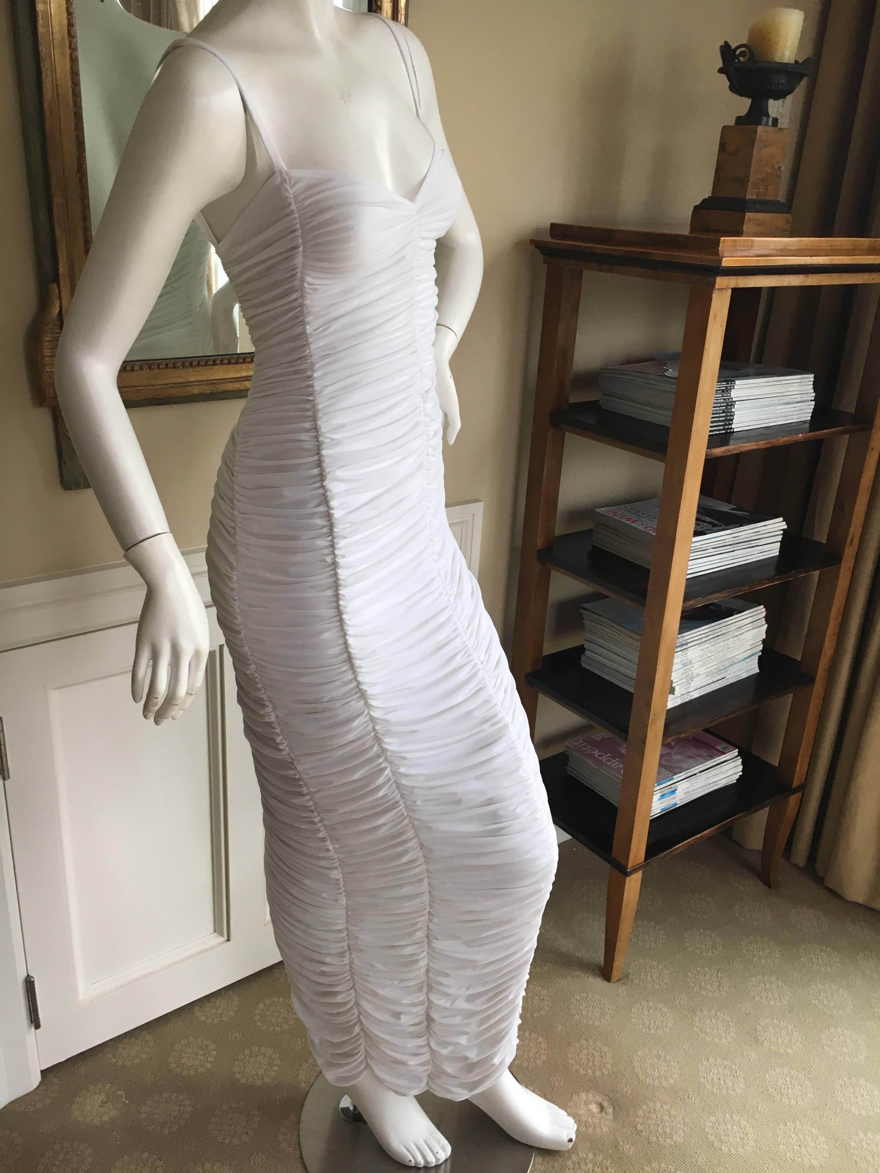 Iconic 1970's parachute dress from Norma Kamali.
Such a genius dress at the time, just wriggle in to it and disco down.
Bust 34"
Waist 26"
Hips 42"
Length 61"
Excellent condition
