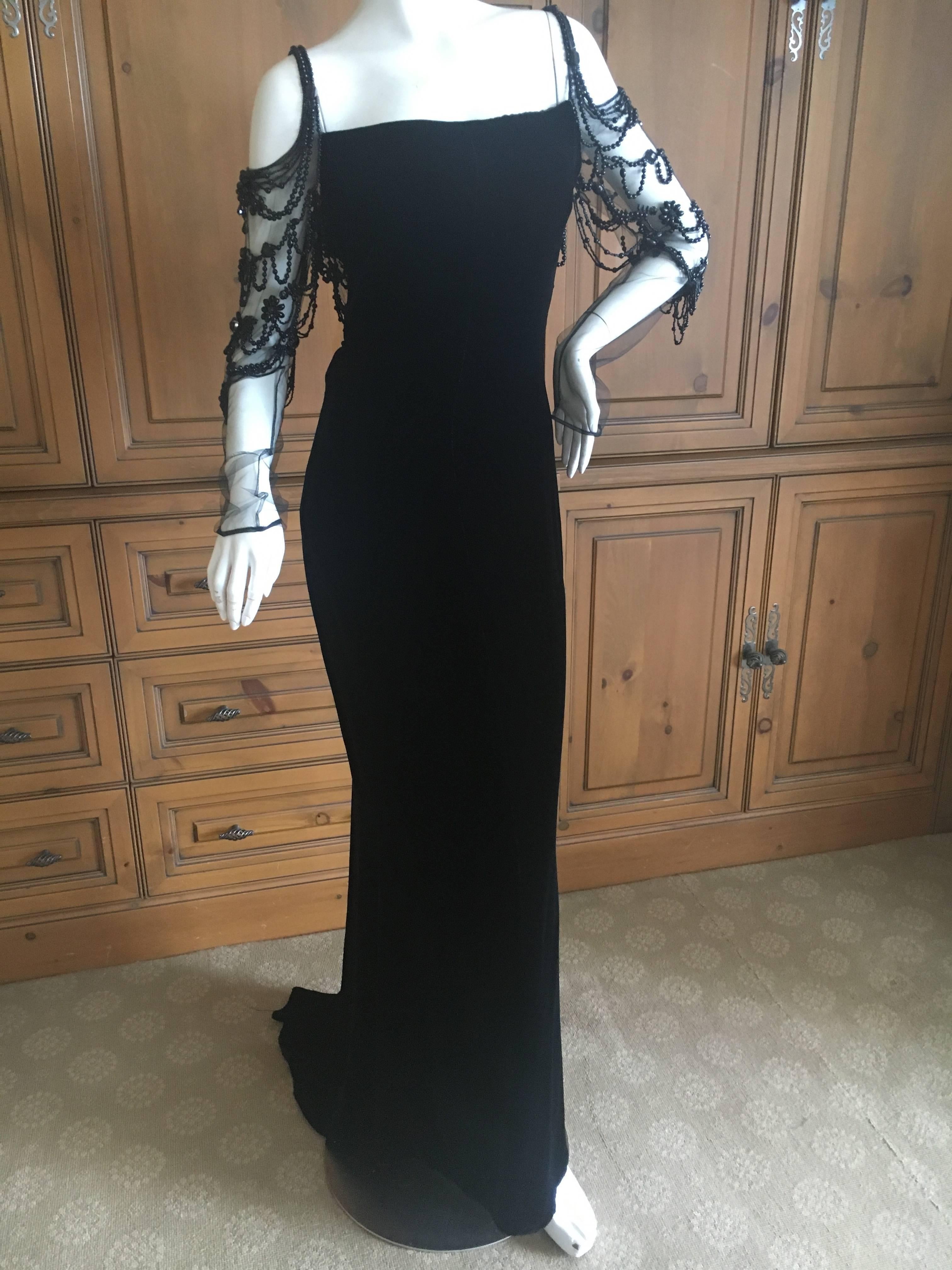Valentino Vintage Black Velvet Evening Dress with Gorgeous Jet Beading on Net

This is such a charming piece.

Size 6

Bust  36" 

Waist 28" 

Hips 42' 

Length 60" Front

Length 64" in back

Great pre owned condition, minor bead