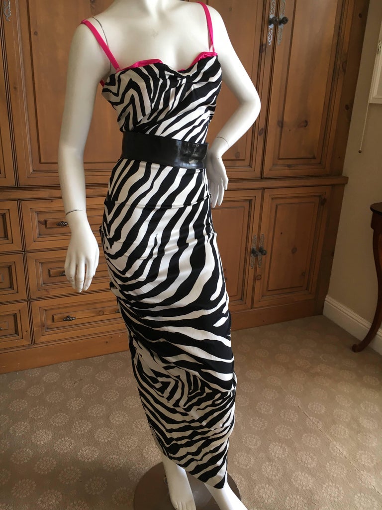 D&G Dolce & Gabbana Zebra Stripe Silk Cocktail Dress. With attached pink bra.
Size 44, runs small, there is a lot of stretch.
Bust 36