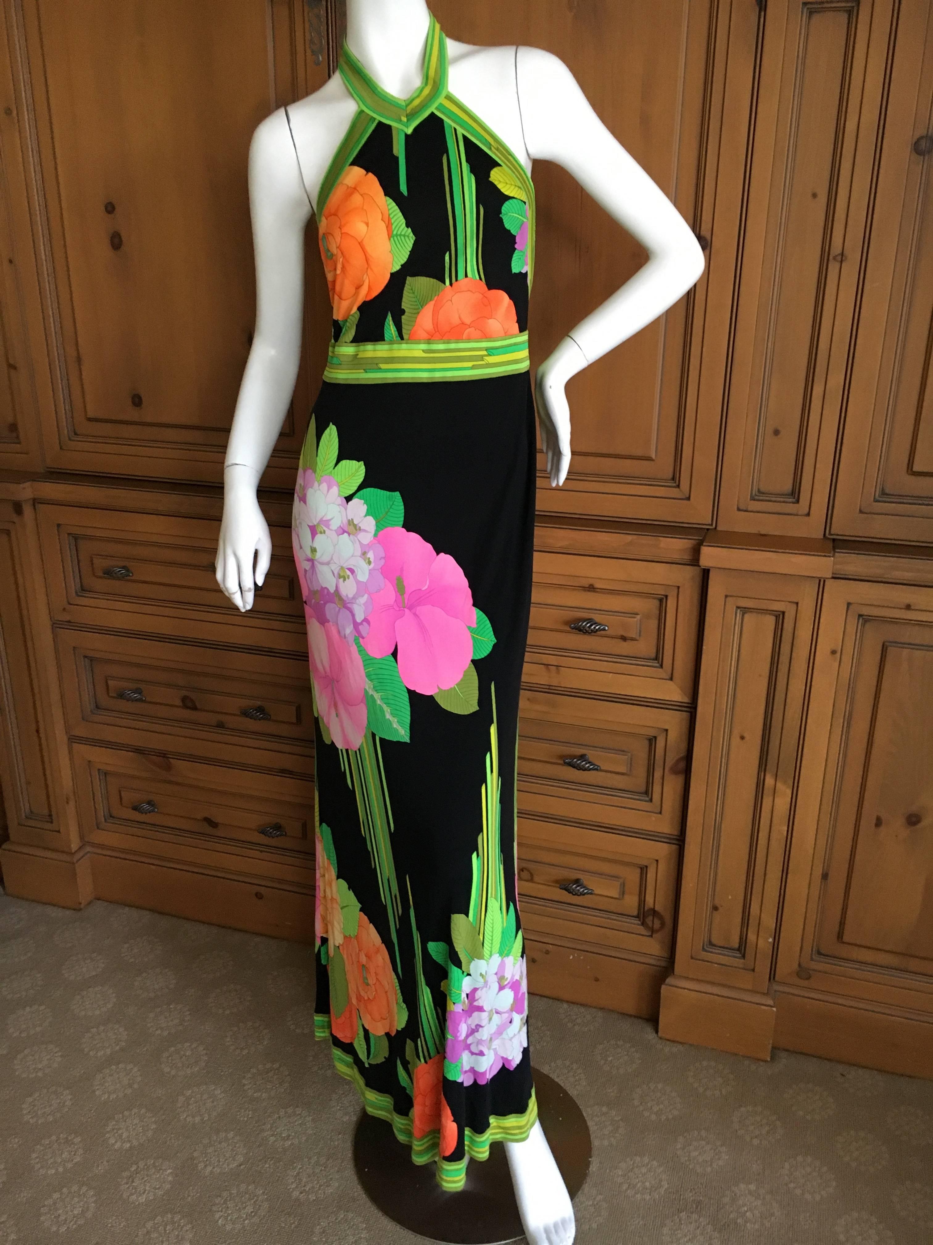 Leonard Paris for Bergdorf Goodman 1970's Silk Halter Dress.
Leonard , Paris was a contemporary of Pucci, using silk jersey printed in their signature florals, Leonard was as expensive, if not more, than Pucci.
Dated 1976 on the Bergdorf label.
Bust