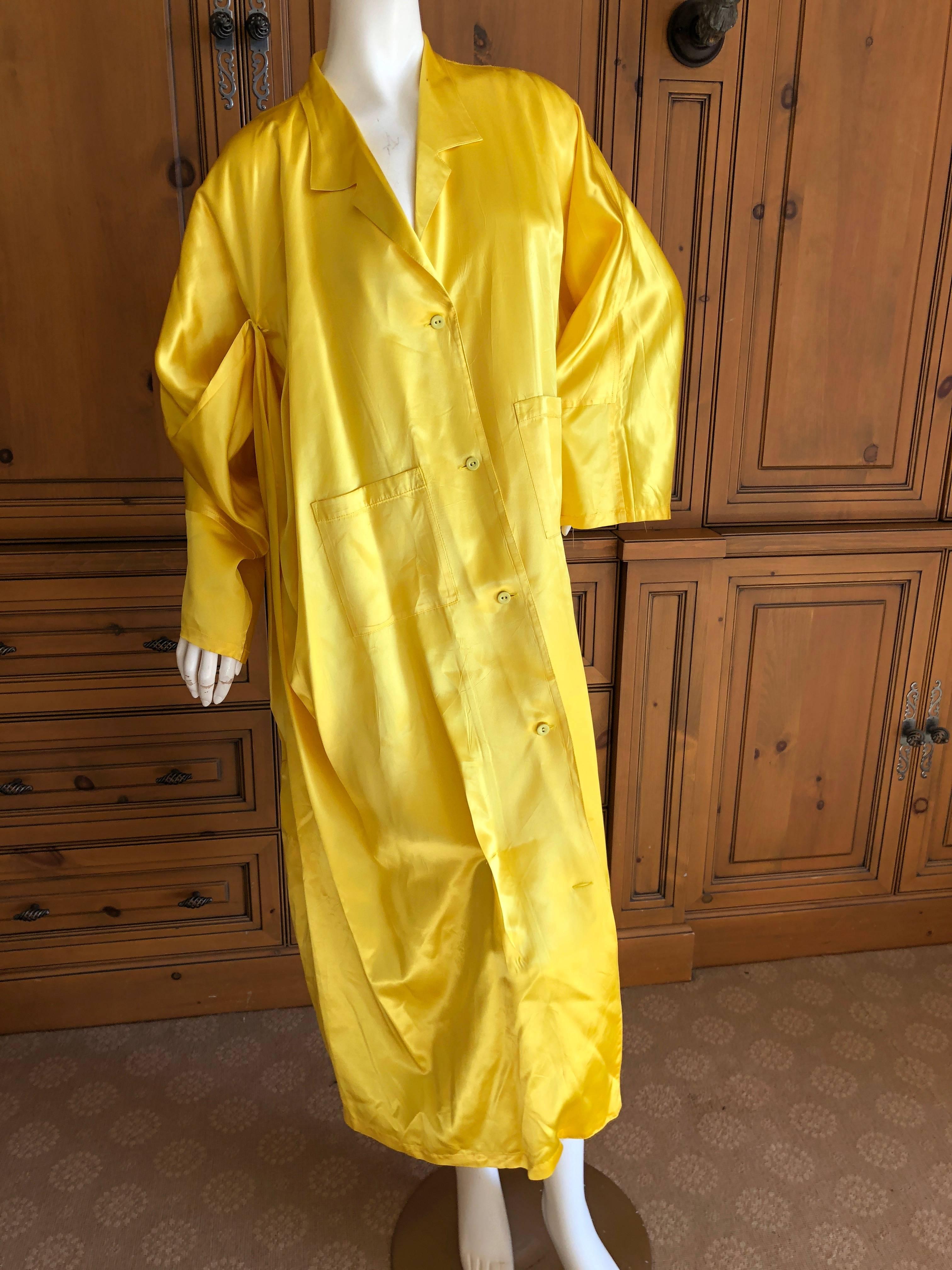 Wonderful oversize coat in an extremely bright neon yellow from Yohji Yamamoto.
Marked size M it is cut very large.
Bust 50