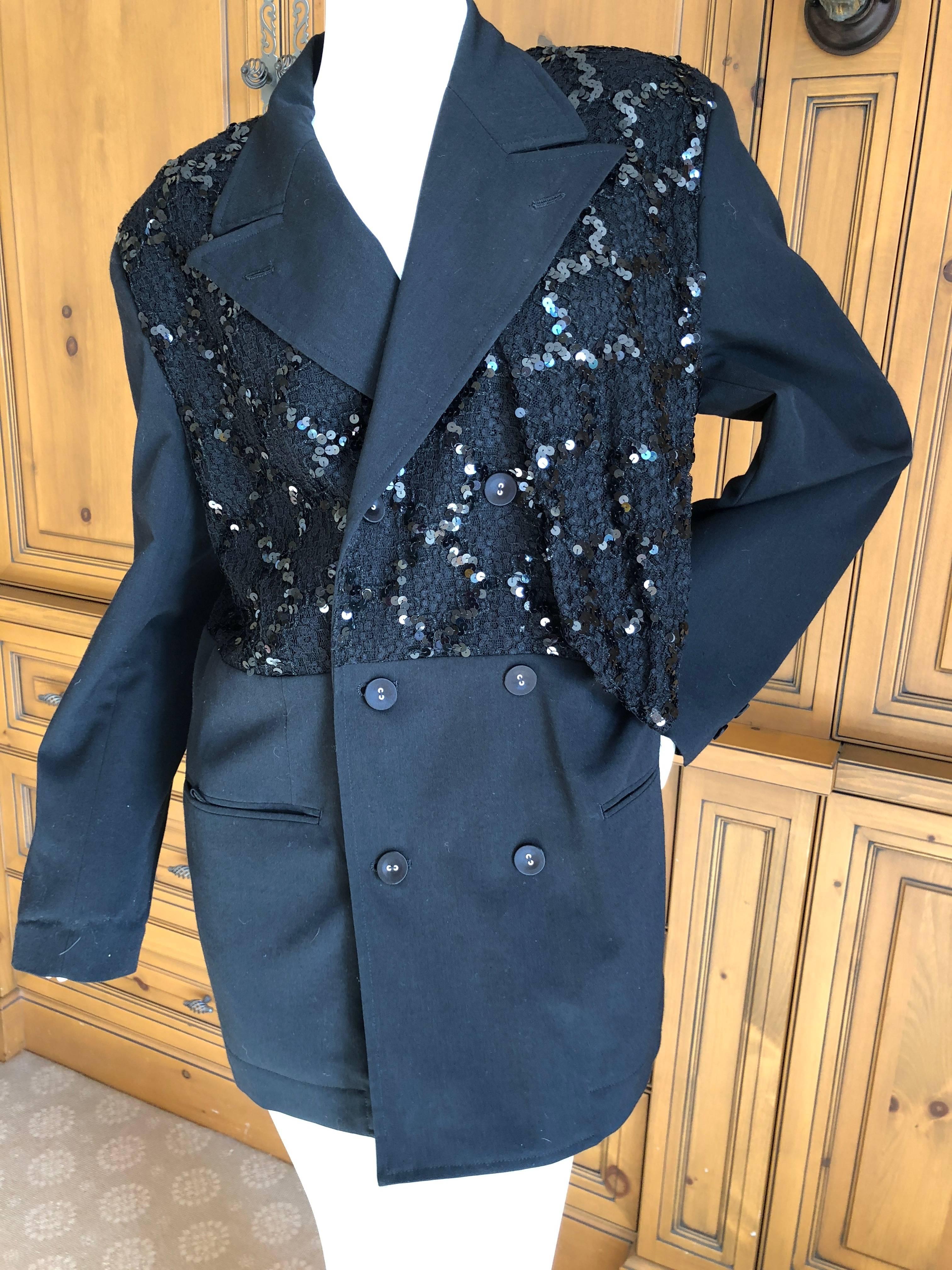 Comme des Garcons 1990's Sequin Embellished Black Jacket.
Sequins are a quilted diamond pattern from a distance.
Marked size M but run's quite large
Please review the measurements, it would also fit a small man.
Bust 50"
Waist 36"
Length