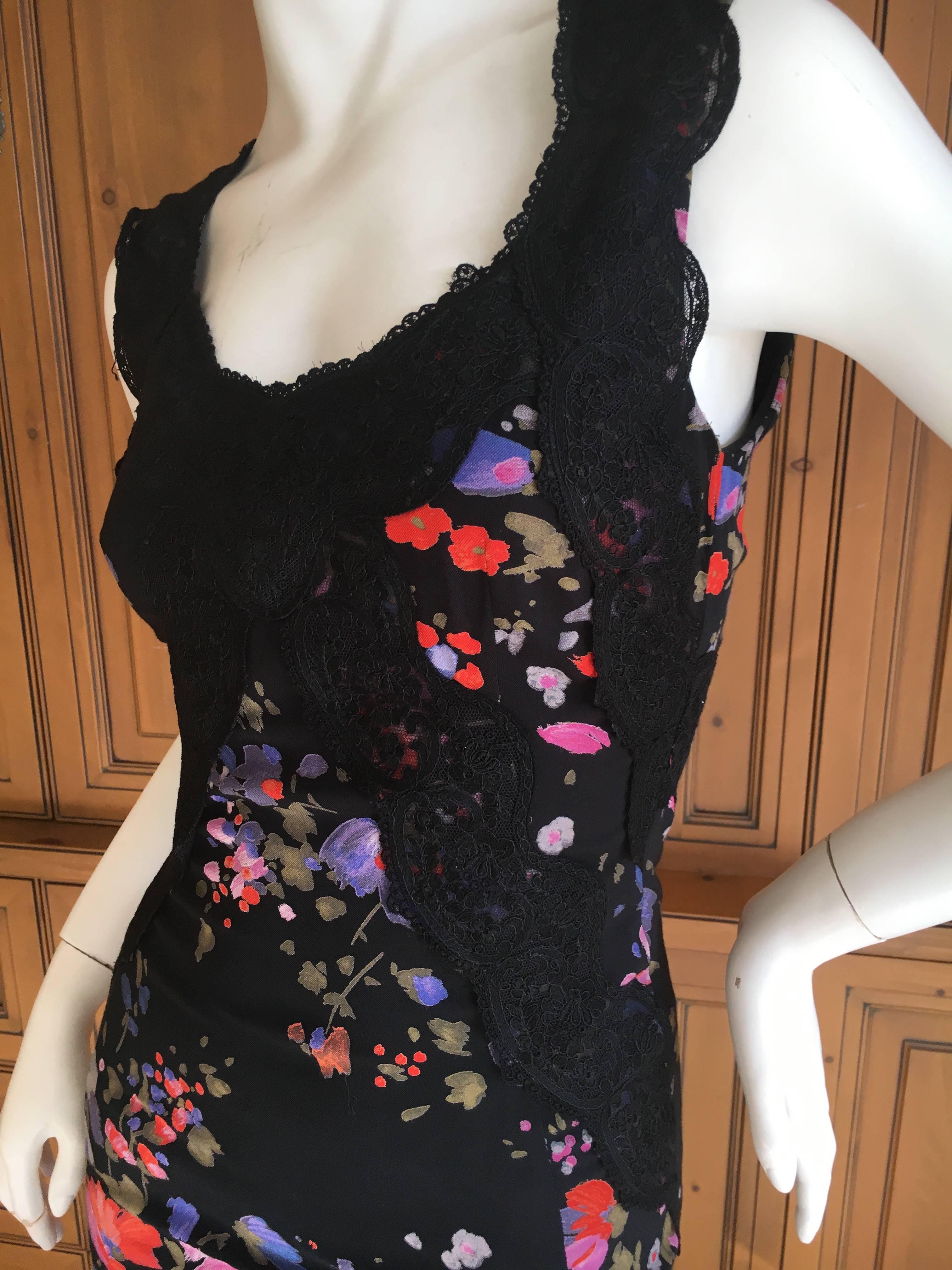D&G Dolce & Gabbana Vintage Lace Trim Floral Dress.
Lots of cling to this sexy dress.
Size 38
Bust 36"
Waist 26"
Hips 39"
Length 39"
Excellent condition