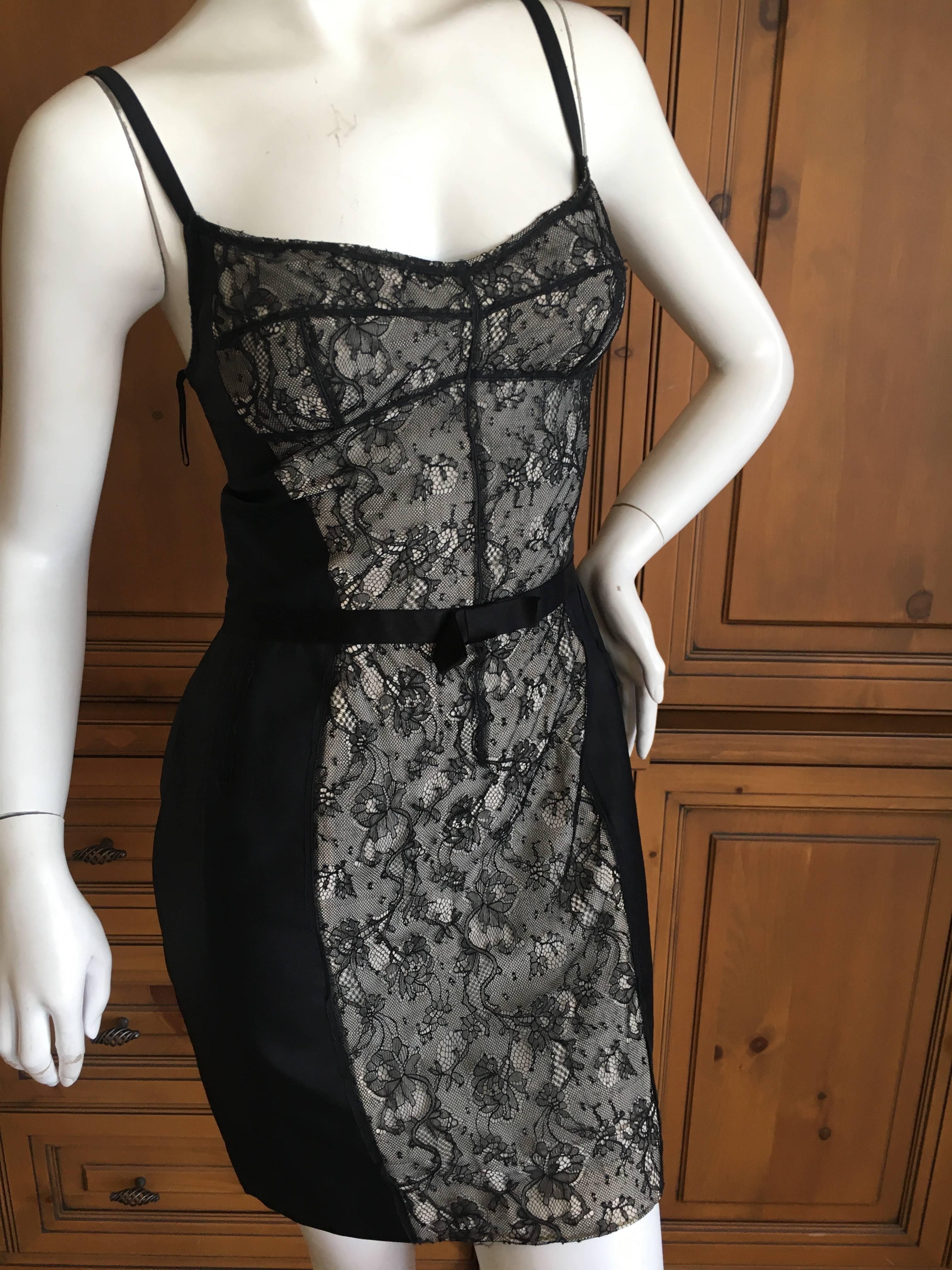 Charming lace front gray cocktail dress from D&G Dolce & Gabbana .
There is a lot of stretch in this.
Size 40
Bust 34"
Waist 28"
Hips 38"
Length 34"
Excellent condition