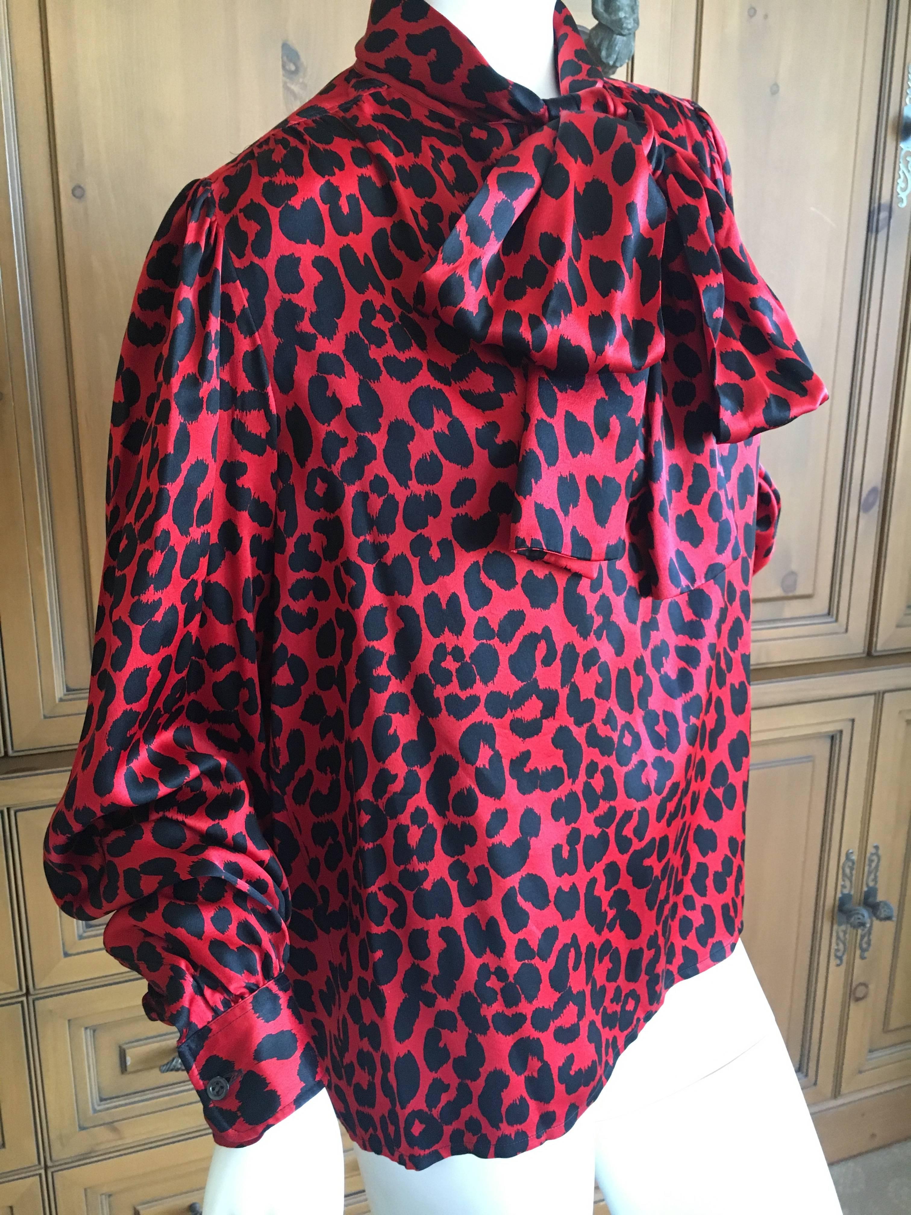 Yves Saint Laurent 70's Rive Gauche Red Leopard Print Pin Tuck Silk Keyhole Blouse with Pussy Bow and Bishop Sleeves.
Size 42

Bust 45"
 Waist 45" 
Length 28" 
Excellent condition