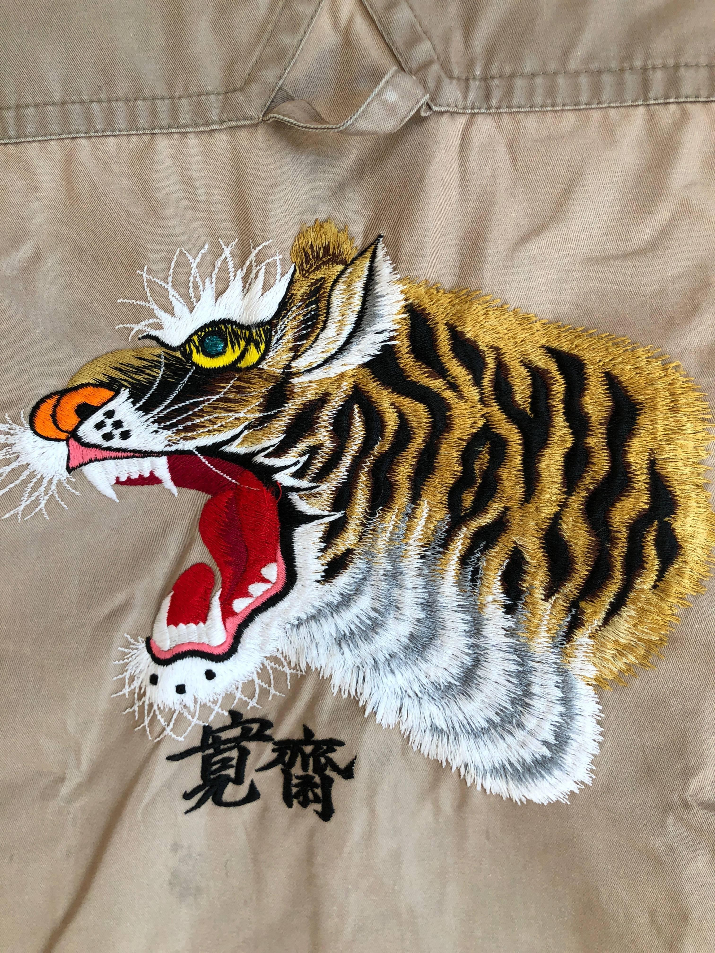 Kansai Yamamoto Khaki Men's Military Shirt with Tiger Embroidery.
Join the Kansai Army.
	A predecessor of designers like Issey Miyake, Yohji Yamamoto, Kenzo Takada, and Rei Kawakubo, Kansai Yamamoto was the first Japanese designer to show in London