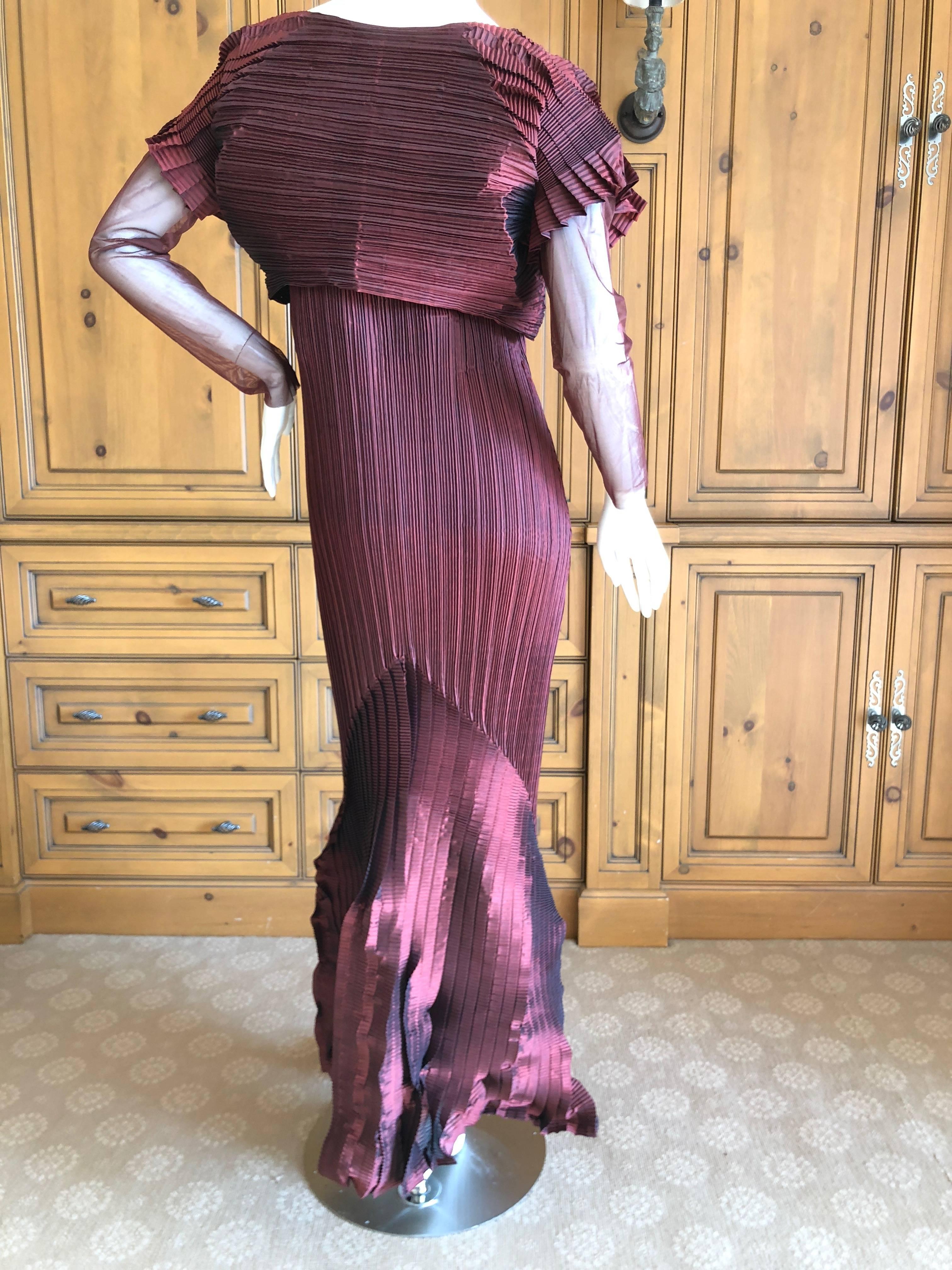 Issey Miyake Fete Vintage Burgundy Evening Dress with Matching Cropped Shrug.
Exquisite dress, the photos don't do it justice.
Japanese Size 2
There is a lot of stretch, the measurements are given un stretched.
Bust 36"
Waist 26"
Hips