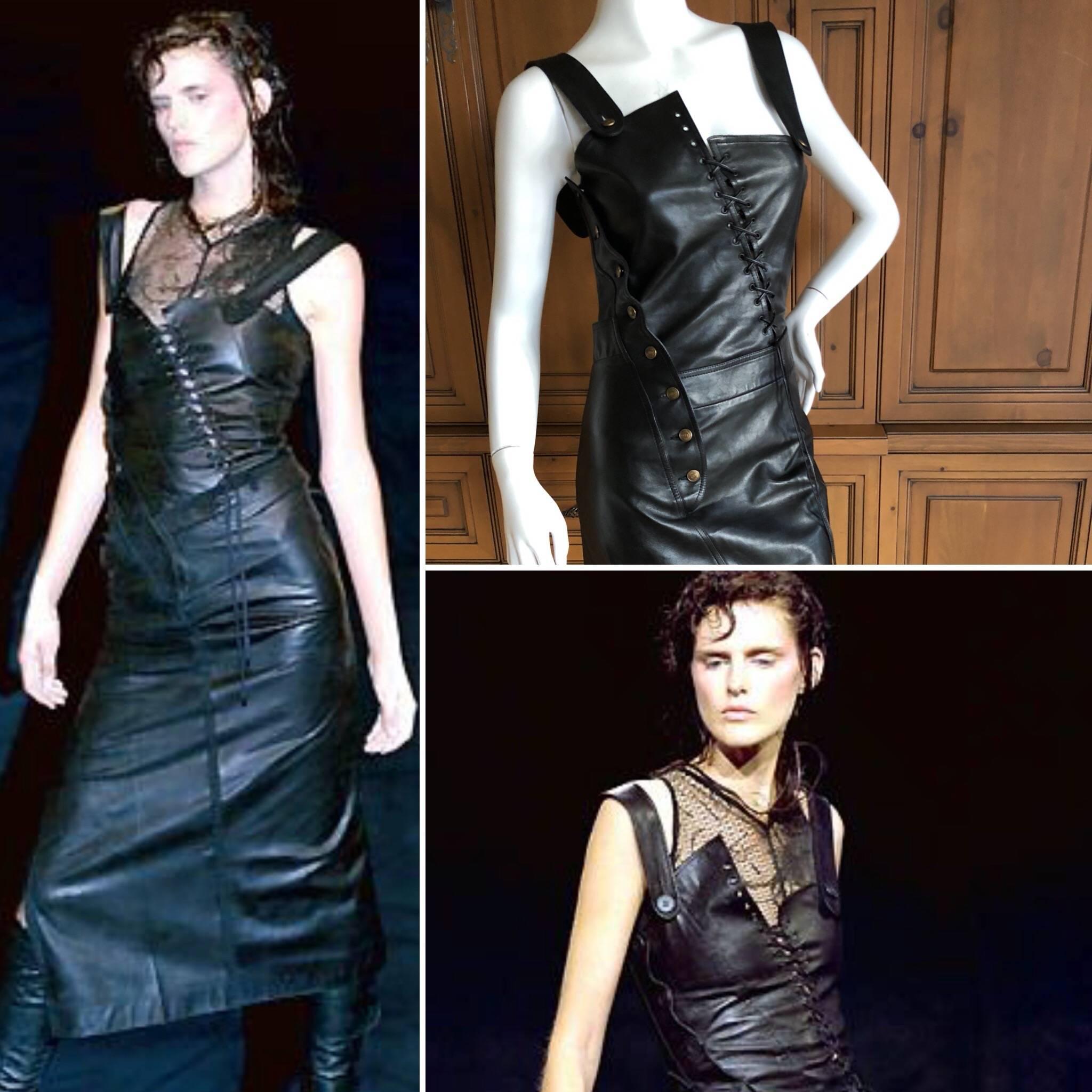 Christian Dior John Galliano Goth Black Asymmetrical Leather Dress
From  Spring 2000, modeled in the show by Stella Tennant
 Size 38 
(size tag no longer attached)
Bust 36