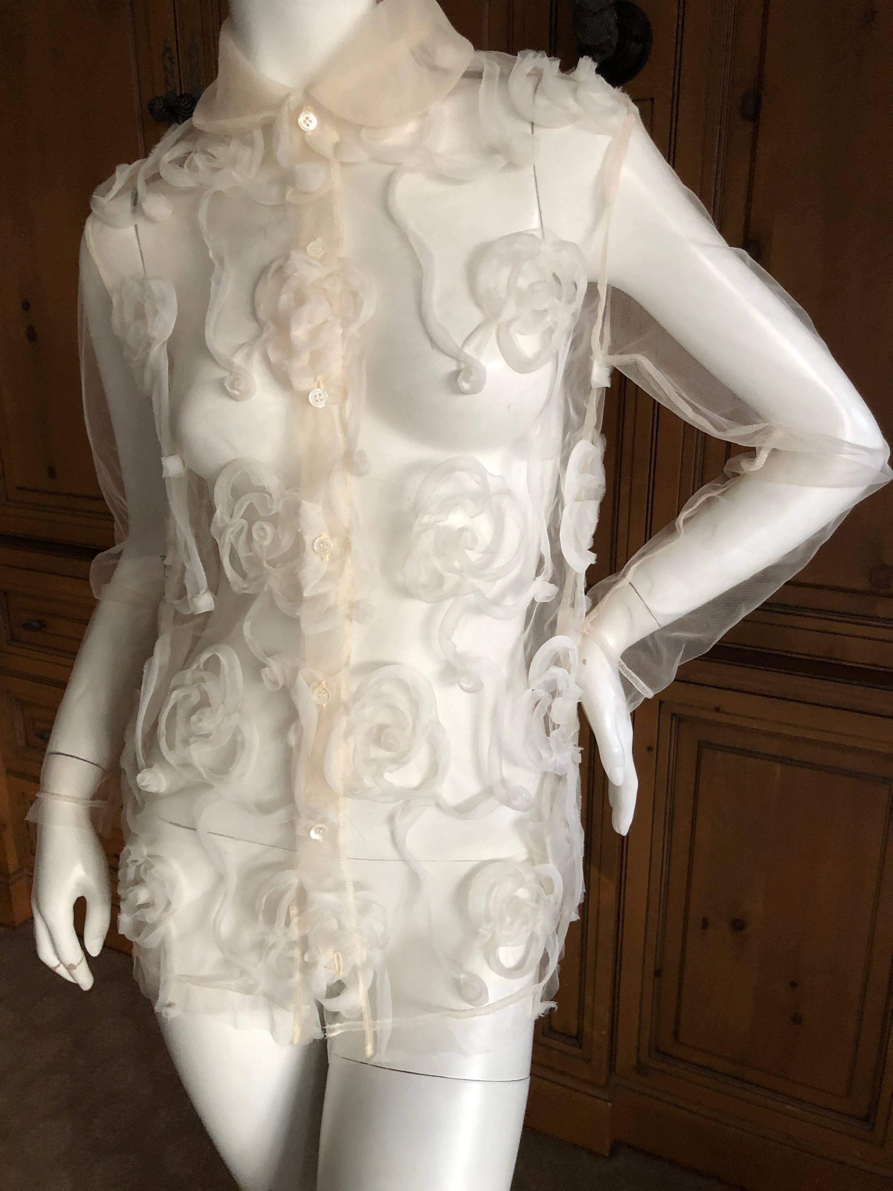 Tricot Comme des Garcons Sheer Blouse with Tulle Overlay Floral Details.
Ivory color, size M
New with tags retail was $475
Bust 40'
Was it 40'
Length 26
