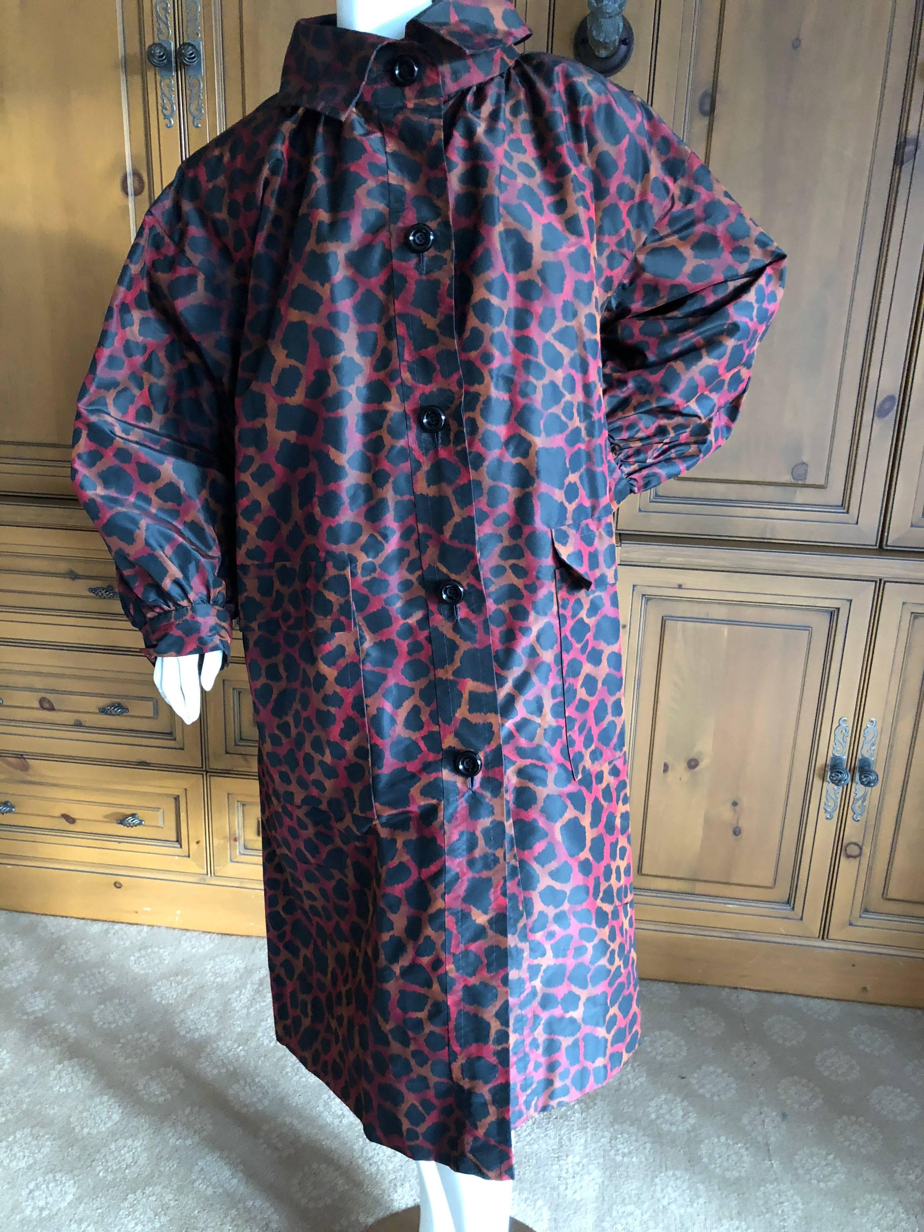 
	
	
Yves Saint Laurent Numbered Haute Couture Silk Taffeta Leopard Print Swing Coat.
So beautiful, the colors are true on the close up photos , shades of red and orange.
Huge swing, beautiful details
As it is cut in the swing style , the