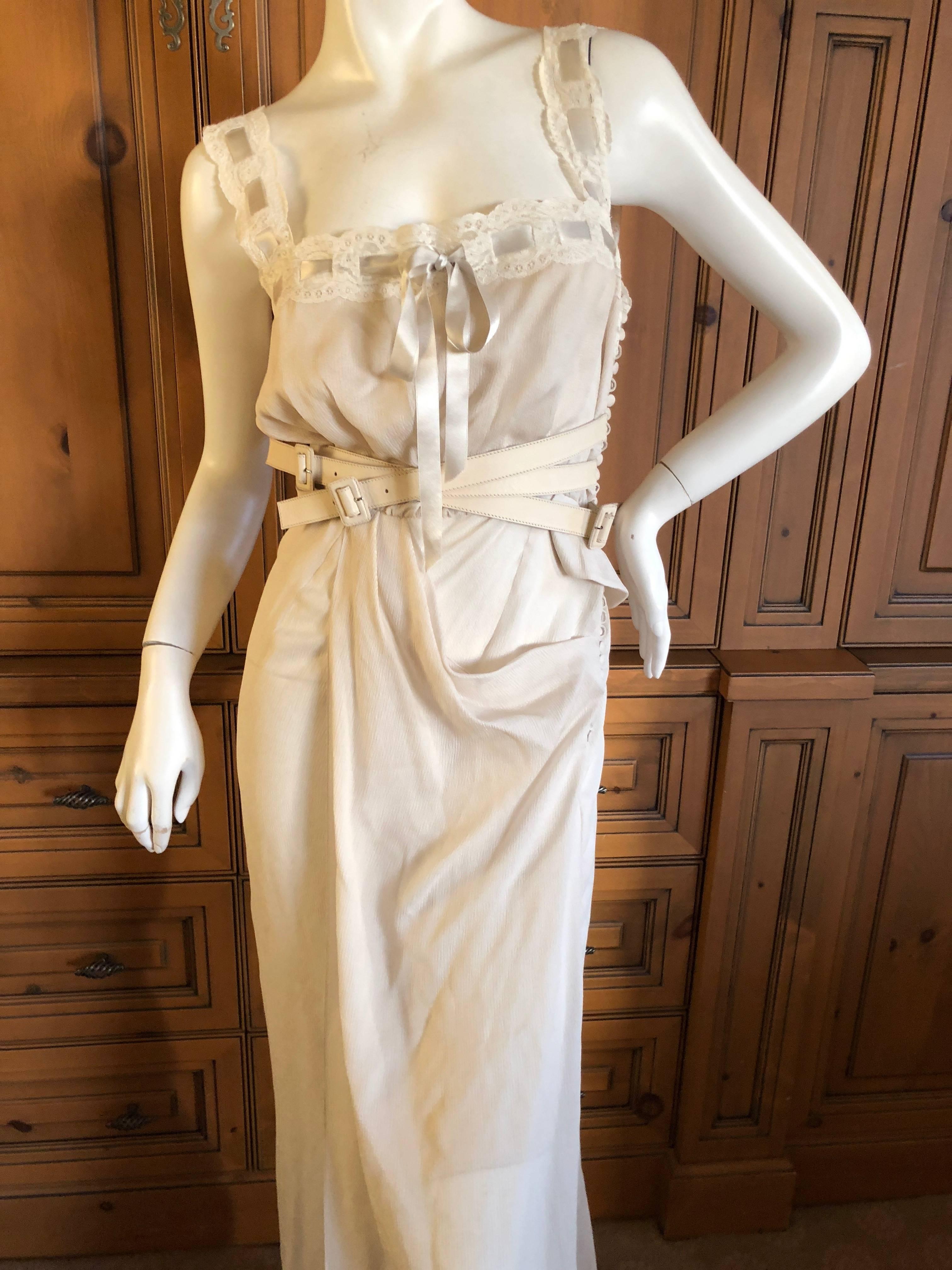 Christian Dior sheer silk chiffon dress with leather belt straps attached, by John Galliano.
Fall 2010, showroom sample
Size 36 (no size tag)
 Bust 35" 
Waist 25"
 Hips 39"
 Length 62"
 Excellent condition