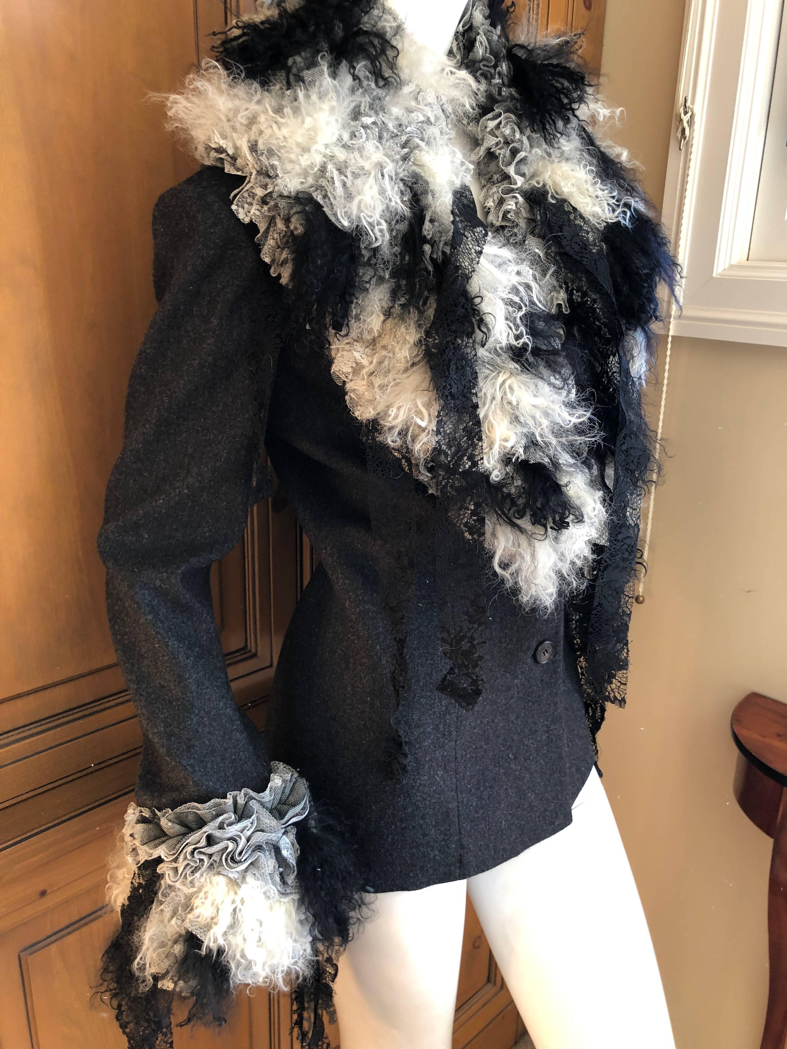  John Galliano Autumn 1995 Jacket w Detachable Elizabethan Ruffle Lace Fur Collar.
So chic, this is fully lined in ivory silk.
Very soft wool cashmere blend.
I show the jacket without the collar, and another photo of the collar detached, wear with