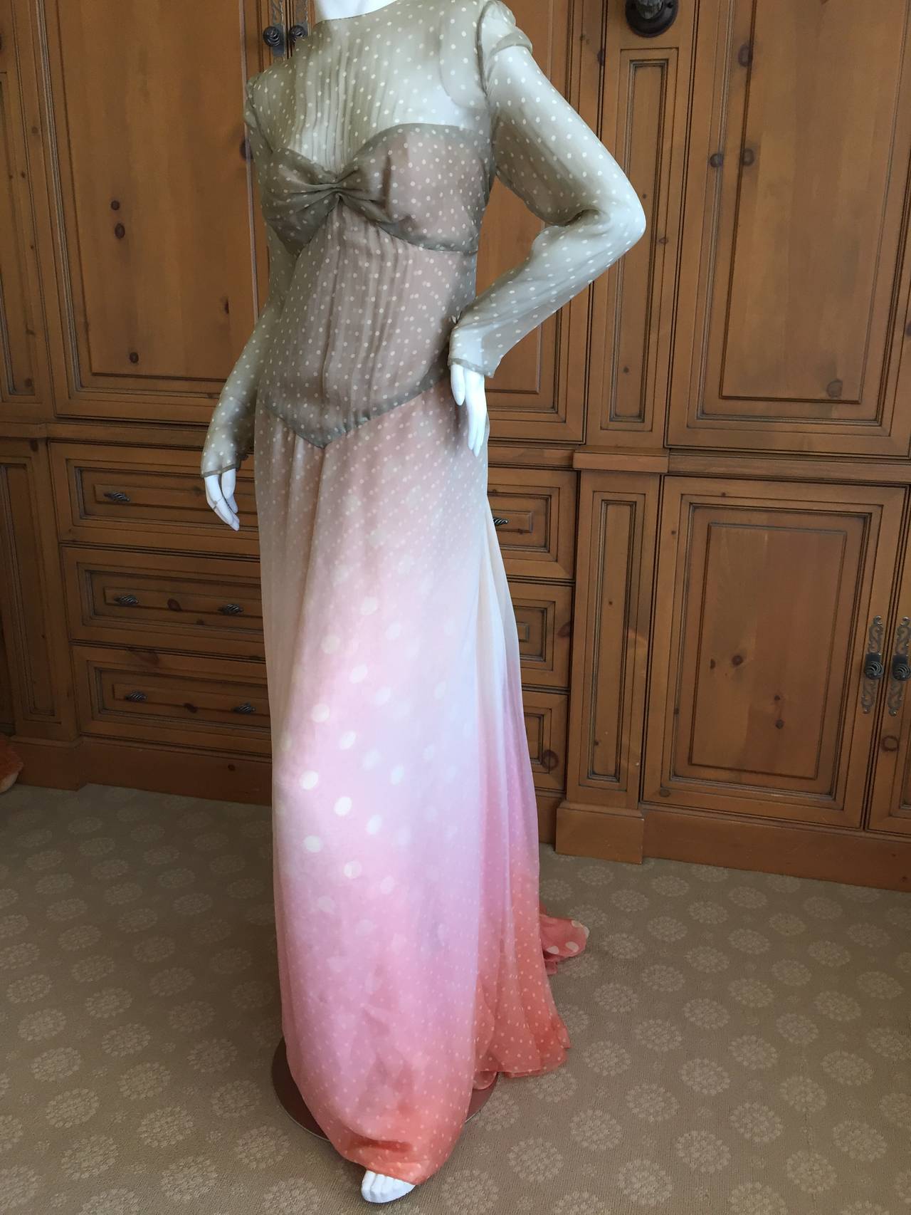 Bill Blass 1970's Sheer Silk Chiffon Polka Dot Ombre Illusion Dress
This is hard to capture in a photo.
The bodice is semi sheer and has a bandeau illusion, kind of like a belly dancer ensemble.
Miles of silk chiffon, it would be fun to dance
