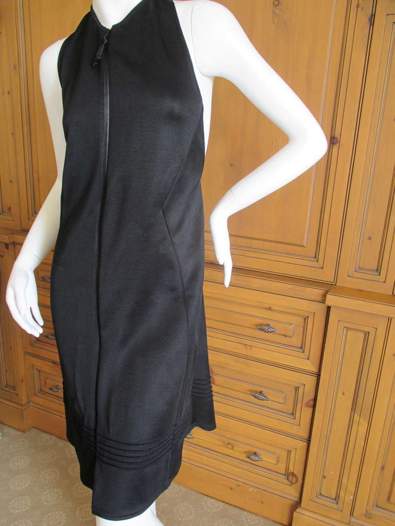 Chado Ralph Rucci Sexy Back Zip Front Little Black Dress 

Made of a jersey rayon with a front zipper and a wonderful sexy back
sz 8 

Measurements: Bust 36“, Waist 30“, Hip 41“,  Length 40“

Excellent condition