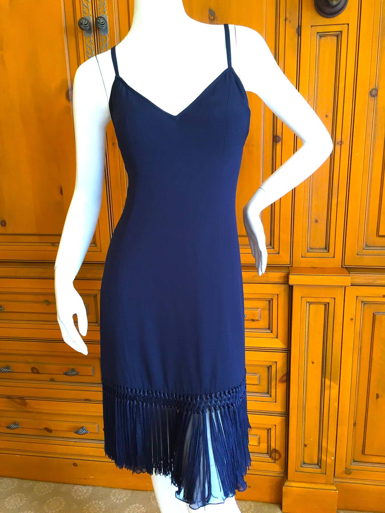 Valentino Boutique Vintage Navy Blue Fringed Dress w Matching Fringed Cashmere Sweater
This is such a wonderful set, in motion it is exquisite
Size 6
Dress
Bust 36
