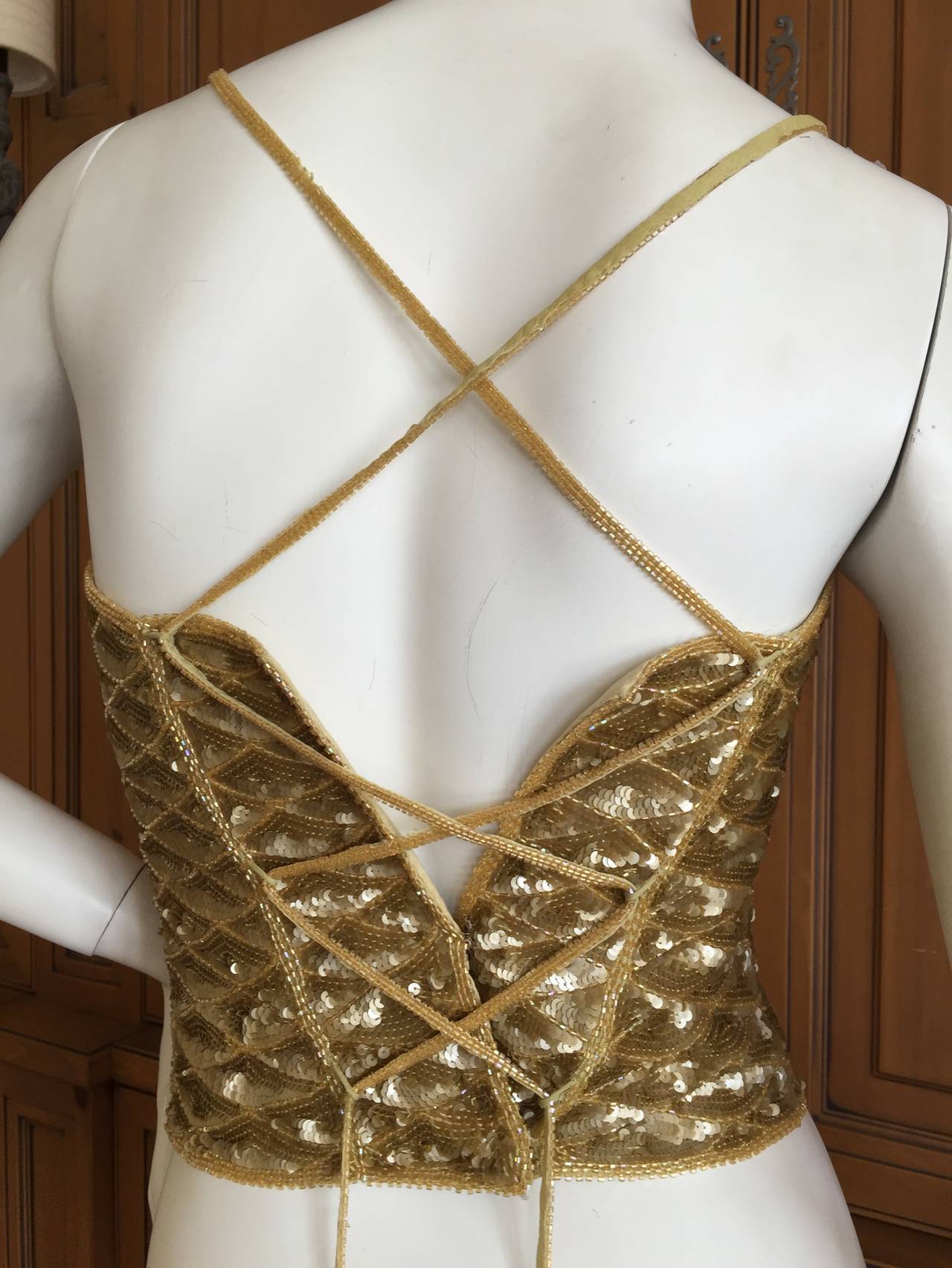 Ferragamo Vintage Gold Sequin Top w Corset Lace Back
This is so pretty in person.
Sz 40 
Bust 34"
Waist 25"
Length 15"