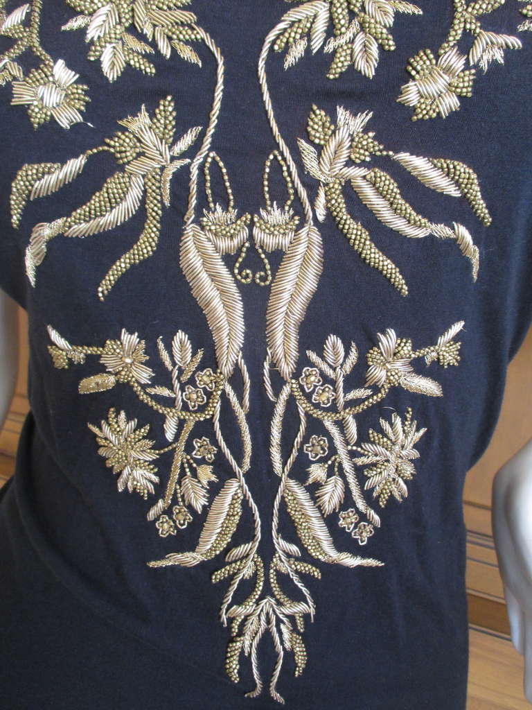 Alexander McQueen Black Cotton Blouse with Gold Beaded Detail on Front 
Exquisite Goldwork embroidery with golden threads
A real Hi / Lo piece, a simple cotton tank top embellished with Couture beadwork
Size 40