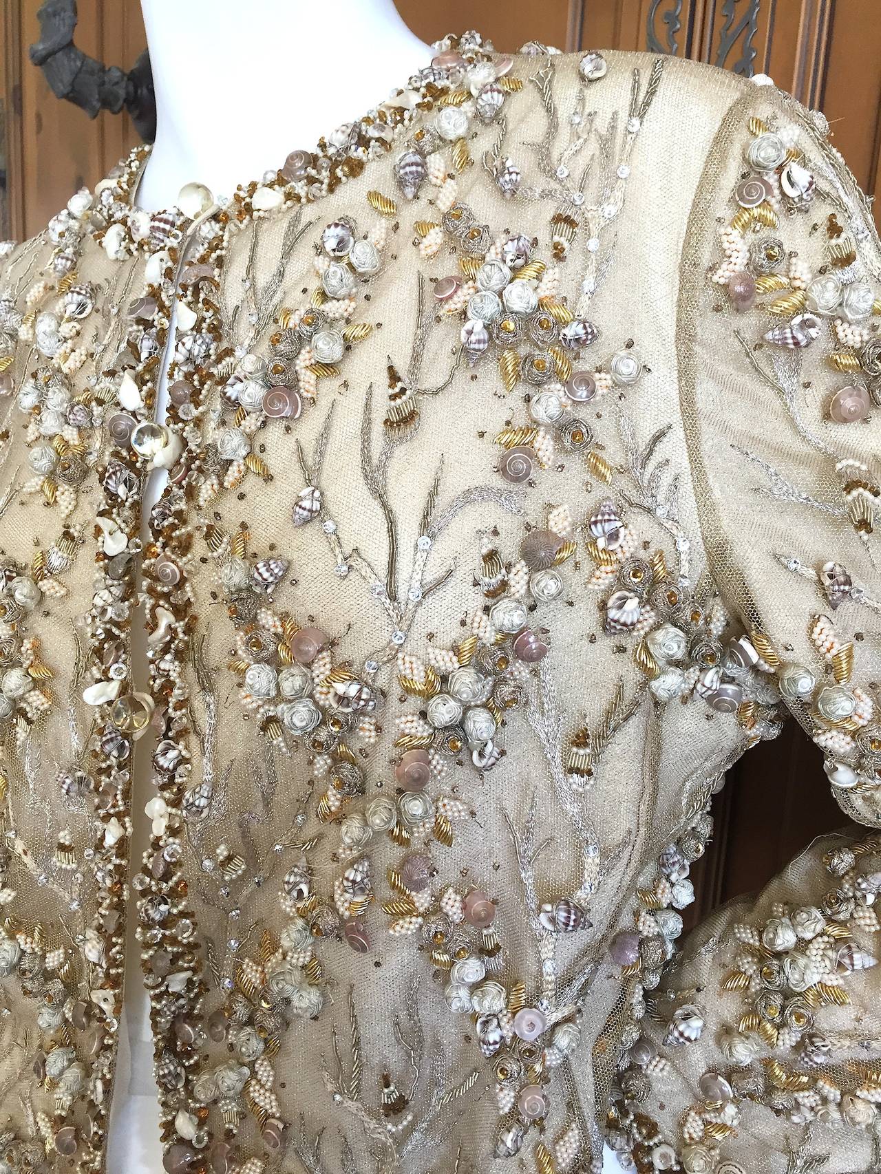 Bill Blass Heavily Embellished Shell, Bead and Pearl Trim Vintage Jacket .
This is a work of art. The hand work that went in to making this is astonishing.
Please use the zoom feature to appreciate this piece, it is really special.
Size