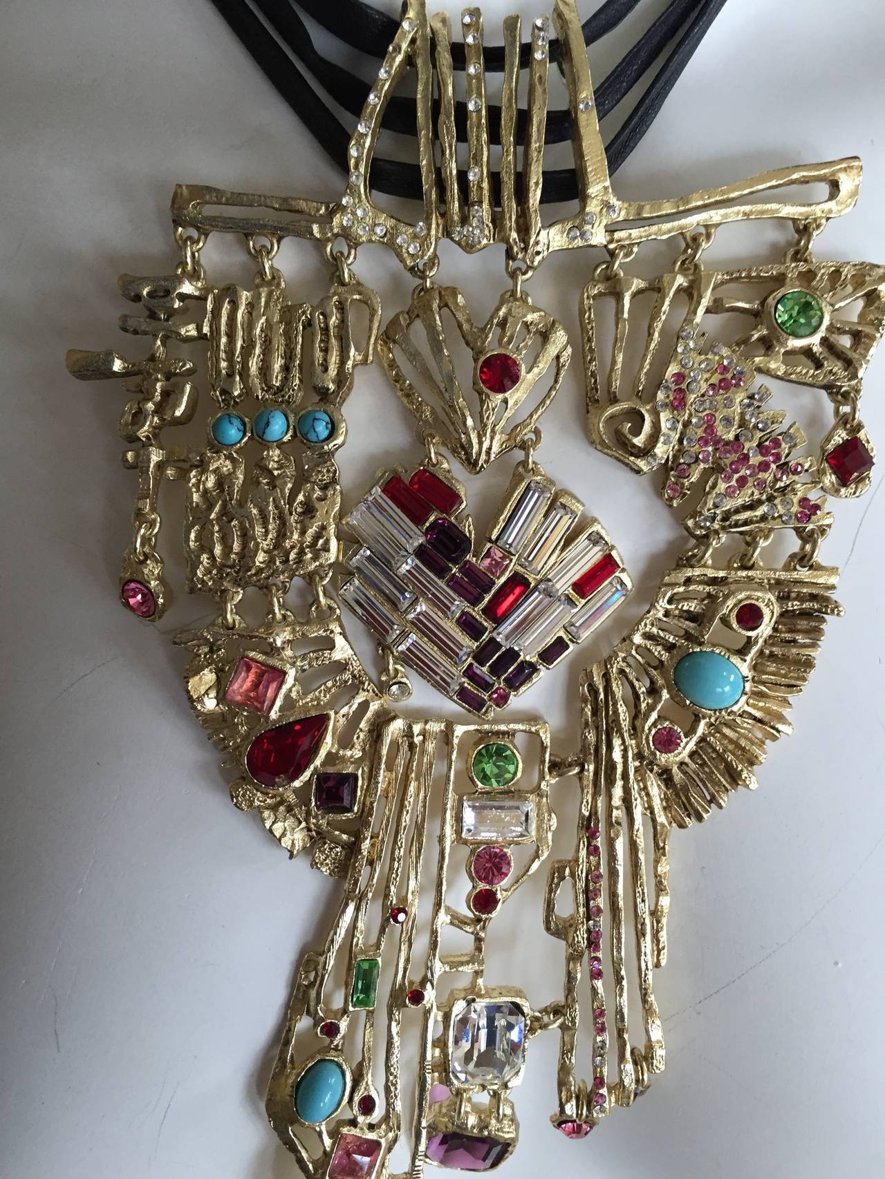 Wonderful vintage Necklace earrings and bracelet from Christian Lacroix.
New in Christian Lacroix box.
The crystals are from Swarovski, and the cabachons are glass.
The decorative metal on the necklace measures 7