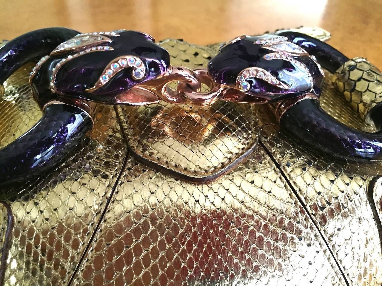 Gucci by Tom Ford Rare Limited Edition Mini Gold Python Clutch with Jeweled Serpent Horsebit

This is exquisite.  Golden python skin with purple enamel jeweled serpent horsebit and 
