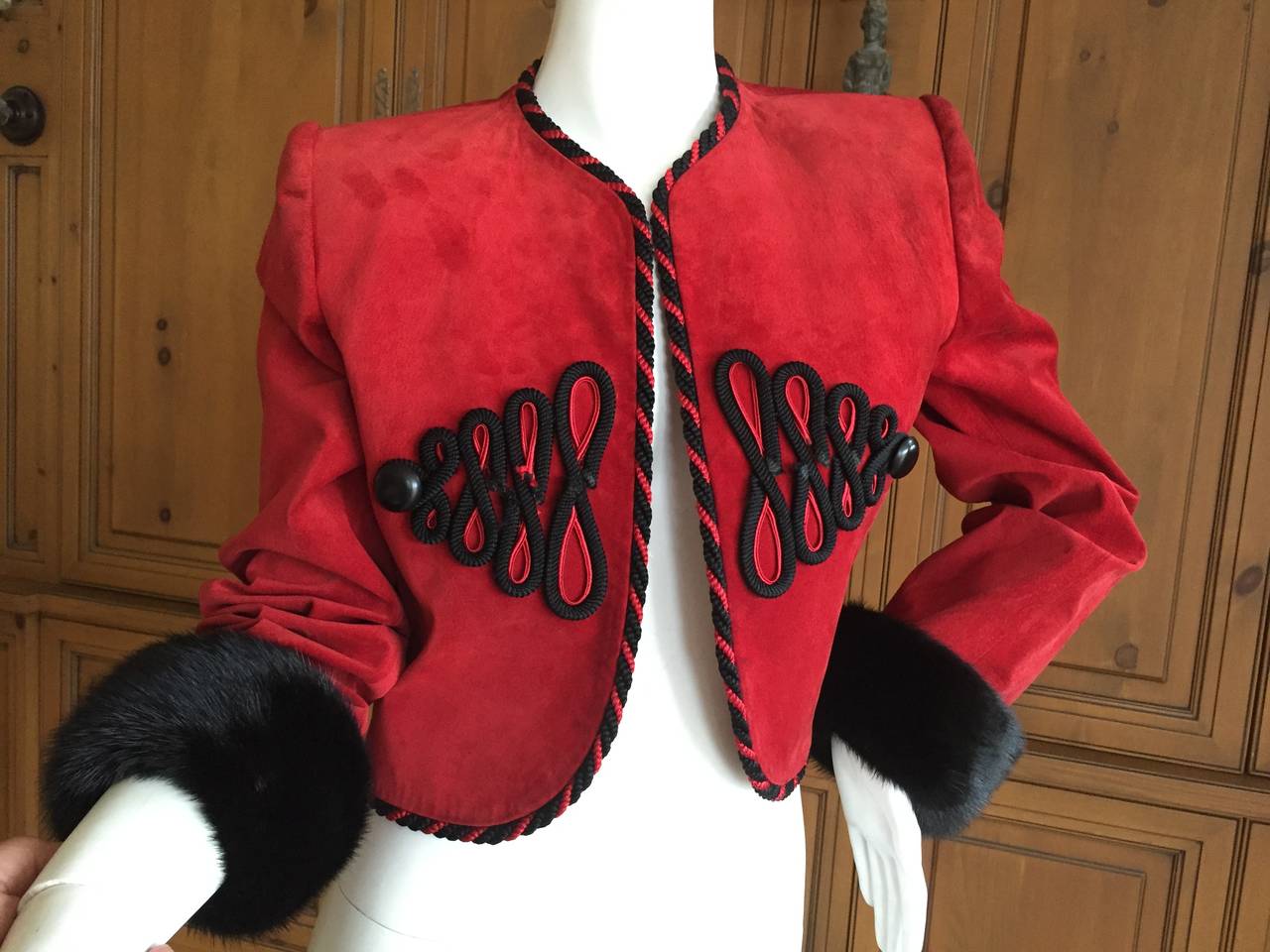 Givenchy Couture Red Suede Mink Trim Crop Jacket
Beautiful details include decorative rope cording and mink cuffs
Sz L
Bust 39
