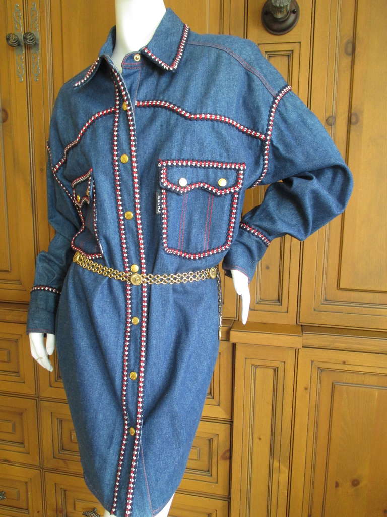 Chanel Western Cowboy Denim Shirt Dress P 2004 
XL 
NEW never worn
Although it is marked European sz 42, it is cut more like a 52.
Please refer to the measurements, the bust is 52