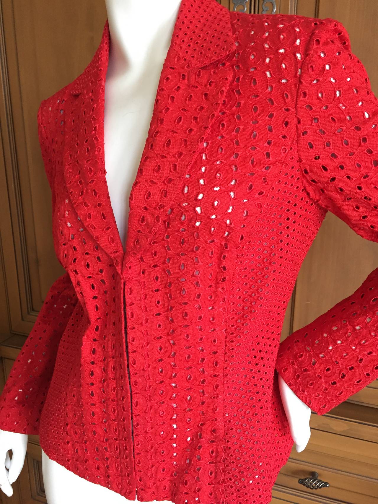 Gianni Versace Couture Vintage Red Embroidered Eyelet Jacket.
This is an early jacket, unlined so it is sheer.
Size 44
Bust 38"
Waist 31"
Length 23"