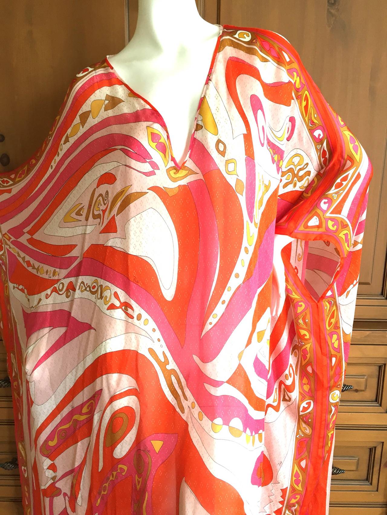 Emilio Pucci SIlk Caftan or Beach Cover Up.
Luscious pinks and oranges.
New with Tags