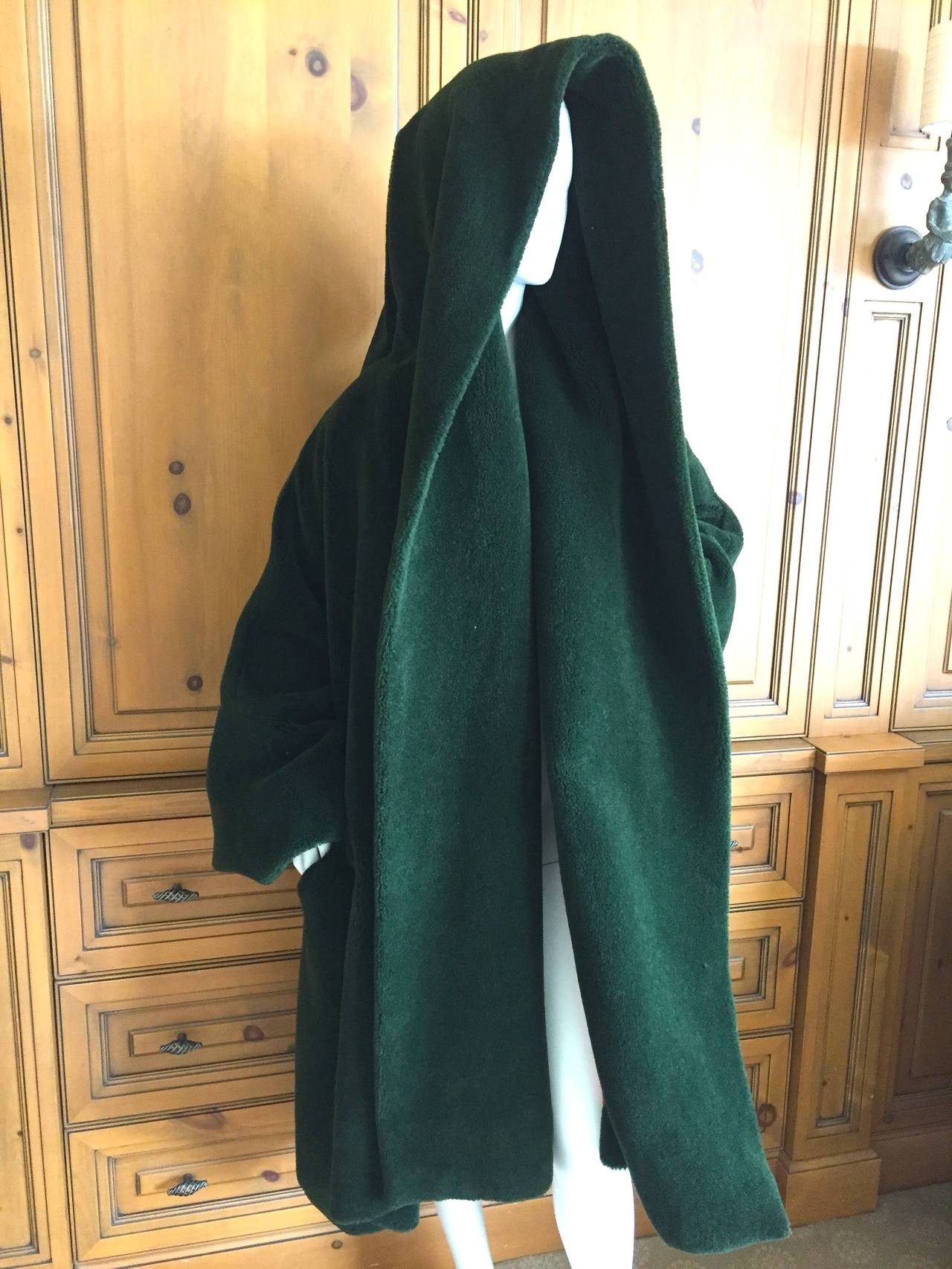 Romeo Gigli 1989 Runway Hooded Green Cocoon Coat
Incredibly rare runway sample from Gigli circa 1989.
Purchased after the runway show at the Milan Gigli Boutique, 1989.
Lined in red stripes this is voluminous, and has considerable