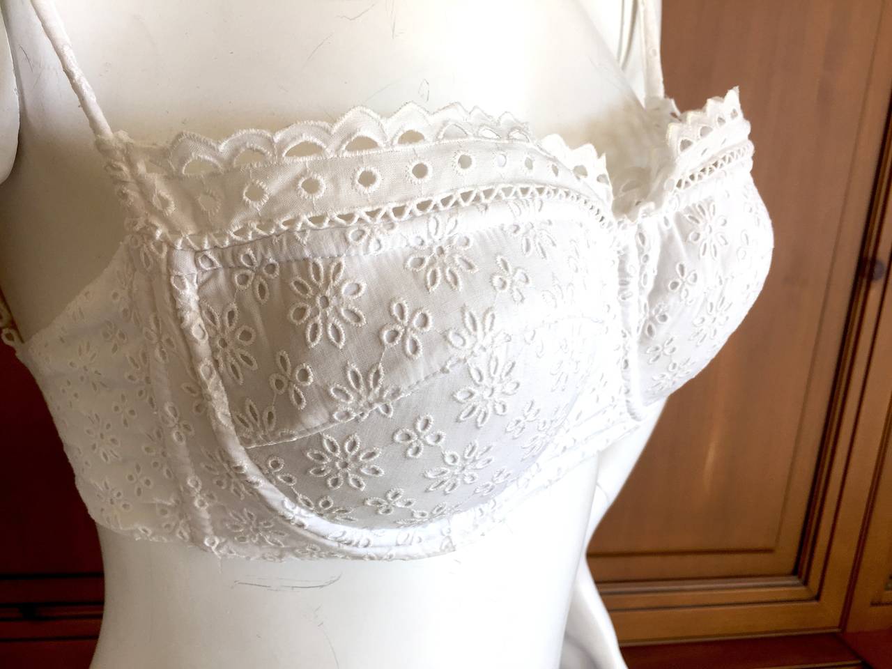 Alaia Vintage Broderie Anglaise Eyelet Bra's.
Two vintage 1980's bra's from Azzedine Alaia.
Generously padded.
One is brand new with tags, the other has been worn and looks like it has a touch of make up along the top of the lace.s
Style called