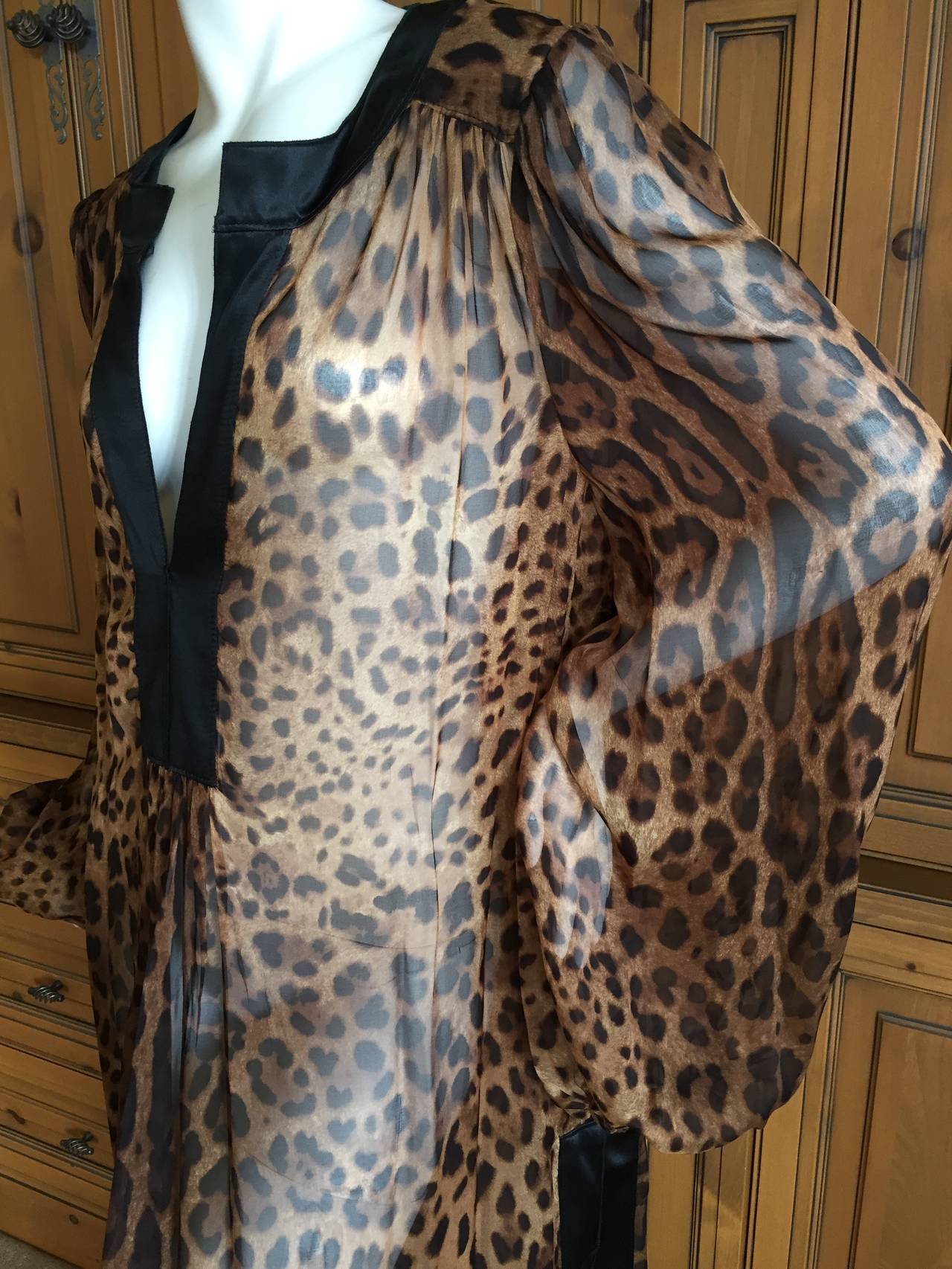 Dolce & Gabbana Silk Leopard Print Bell Sleeve Caftan.
Sheer silk chiffon, edged in black.
Size Large