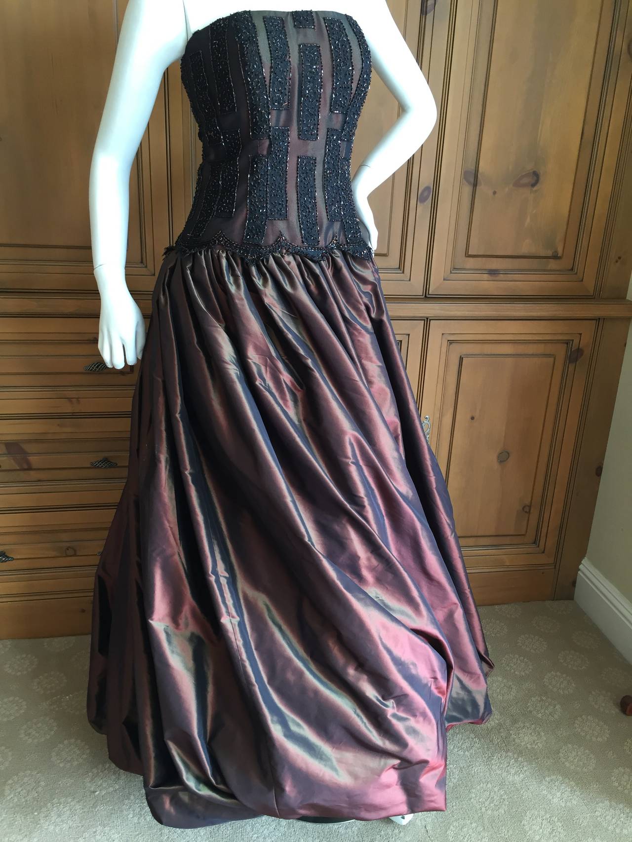 Bob Mackie Dreamy Iridescent Chocolate Silk Beaded Dress with Matching Jacket 
This is so romantic, the skirt is very full with under layers expertly draped.
The top is beading on black netting overlaid on the silk.
There is a full inner corset