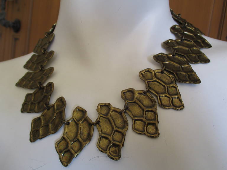 Yves Saint Laurent Rive Guache Vintage Honeycomb Necklace
Brass tone articulated sections look like a honeycomb.