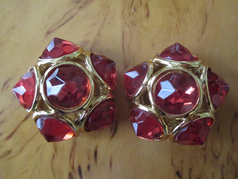 Yves Saint Laurent Clip Earrings
Red faceted stones 
Made in France
1 1/4