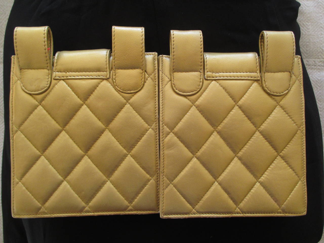 Charming pair of vintage gold leather Chanel bags. Worn on each hip from a belt, like gun holsters of the wild wild west.