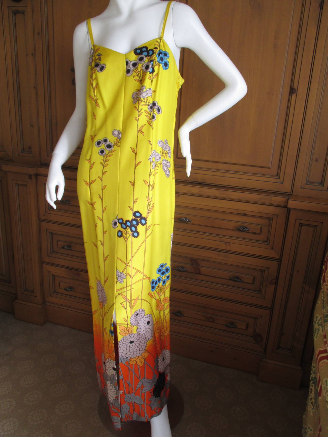 Hanae Mori Yellow Silk Dress & Caftan.
Featuring a yellow sleeveless dress with a matching sheer bell sleeve caftan coat.

Hane Mori opened her fashion house in 1951 and is the first Asian woman to be admitted as an official haute couture design