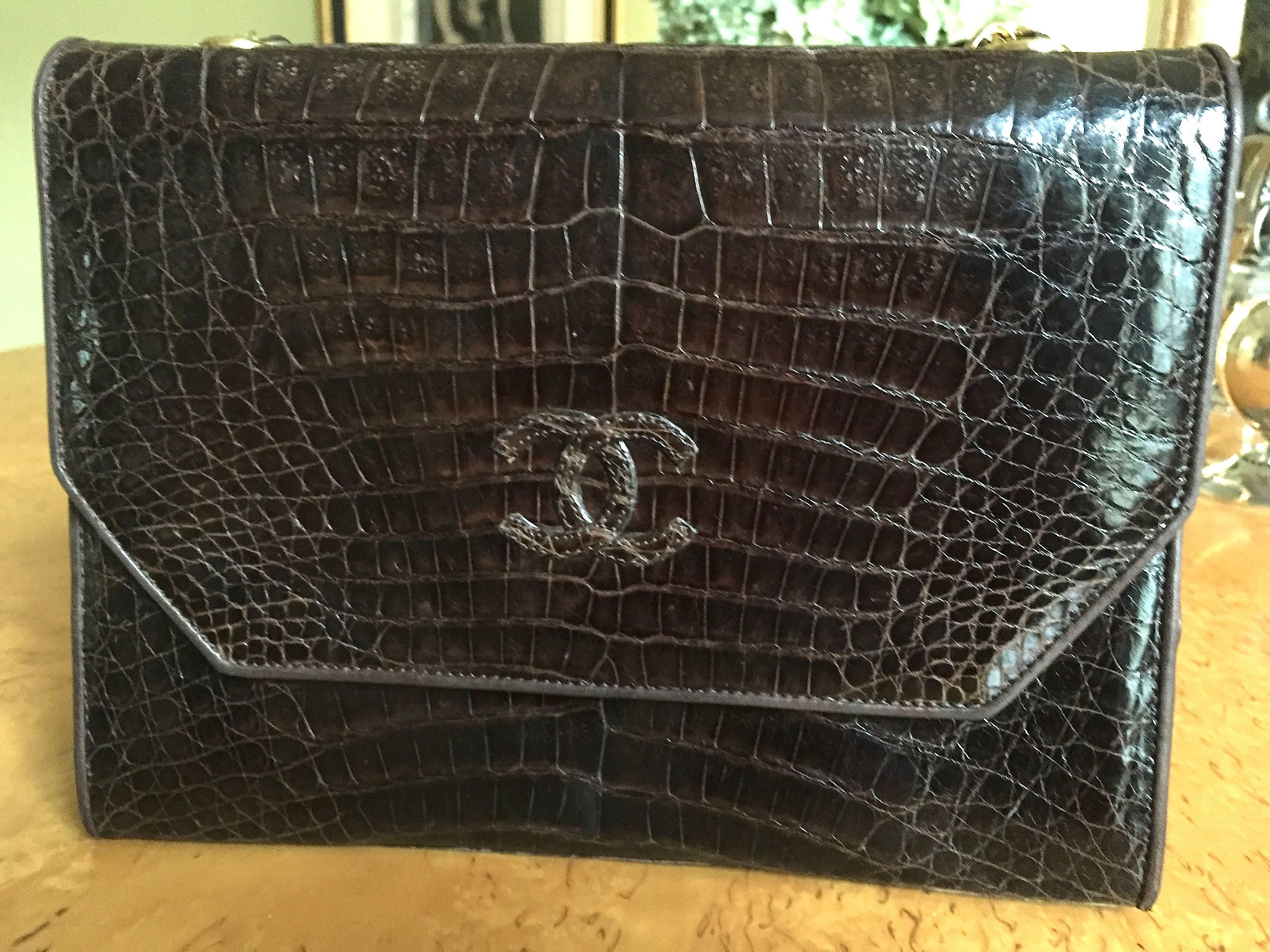 Classic  Vintage Brown Crocodile Flap Bag with Gold Hardware from Chanel.
9 