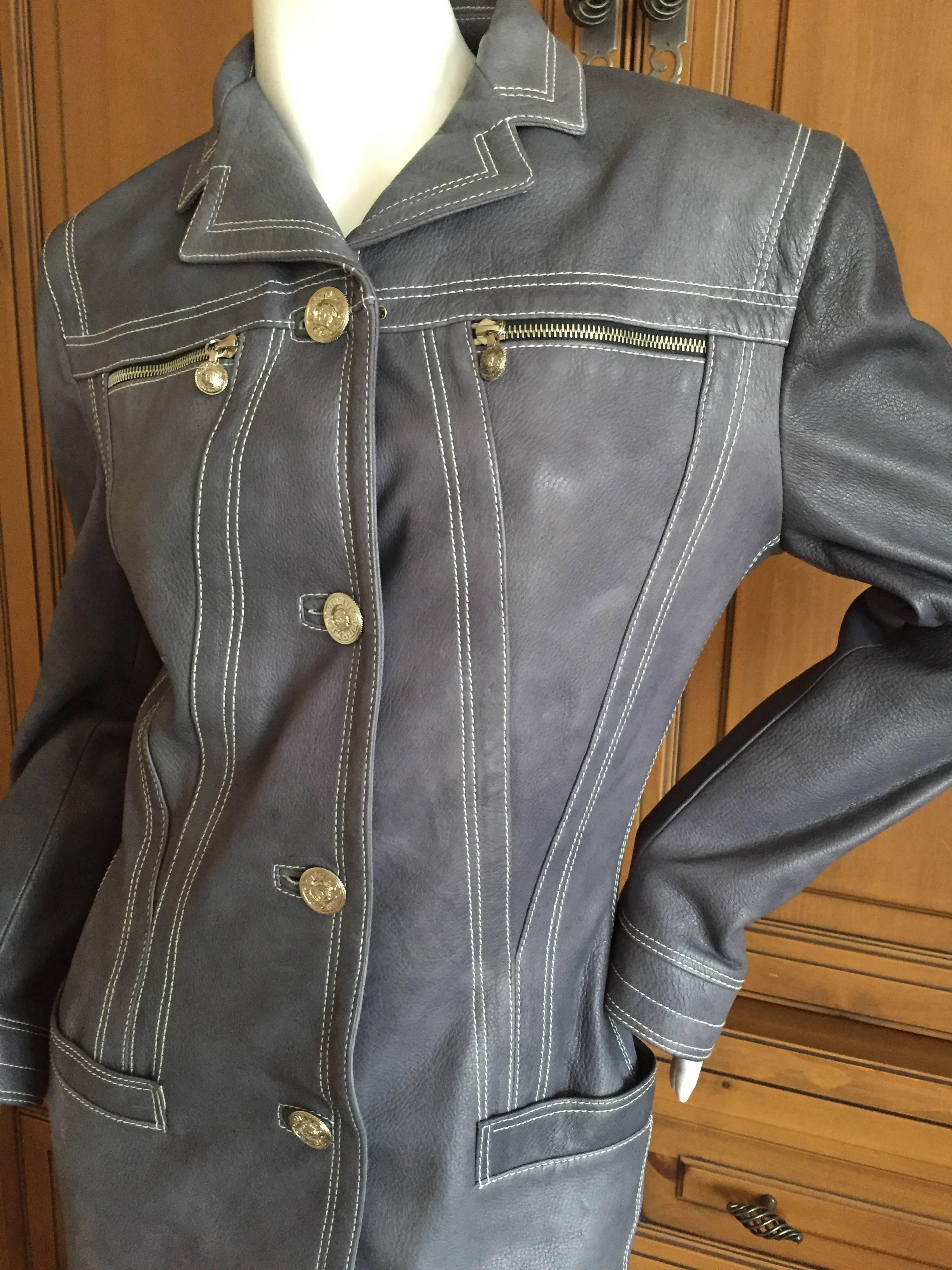 The color of your favorite faded blue jeans, the top stitching on the leather resembles stitching on blue jeans.
SIlver Medusa buttons.
Bust 38