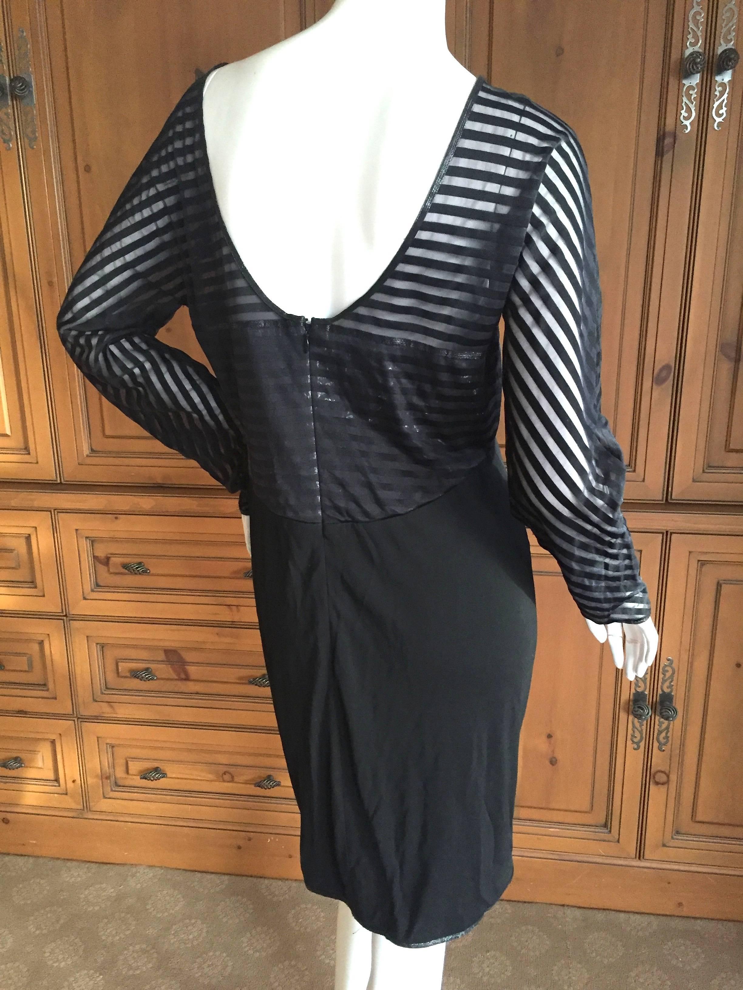 Geoffrey Beene Sheer Stripe Scoop Back Mini Dress.
This is so sweet, the bottom is opaque, the middle is semi sheer, and the top is sheer stripe.
There is a shining strip along the hem.
Much prettier in person, didn't photograph well.
Bust