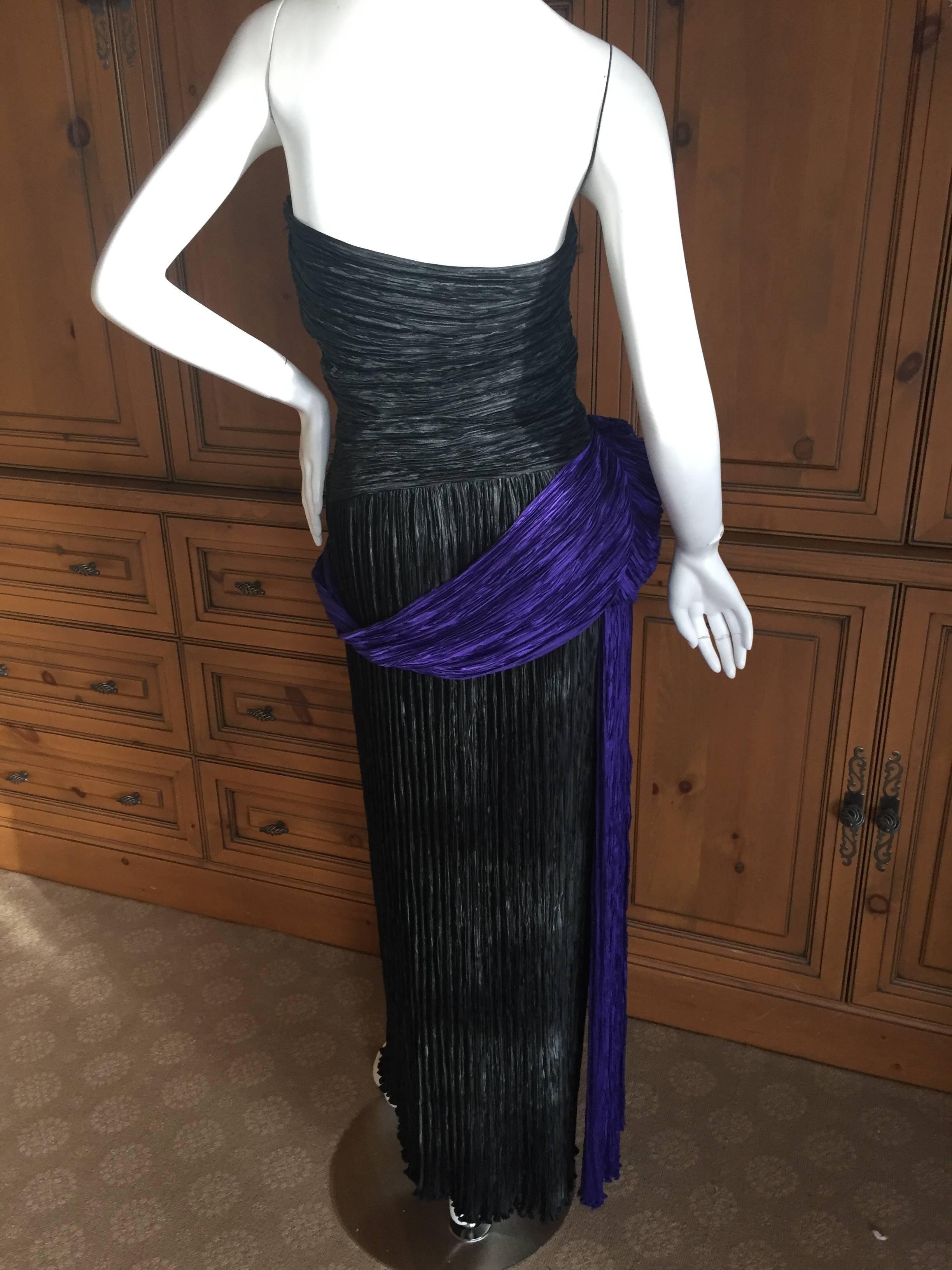 Beautiful black and purple pleated evening dress from Mary McFadden, circa 1979.
This dress was featured in the Antonio Lopez Illustration for the 1979 Cody Awards . (Litho available on 1stdibs)
I'm not certain I styled the draping details