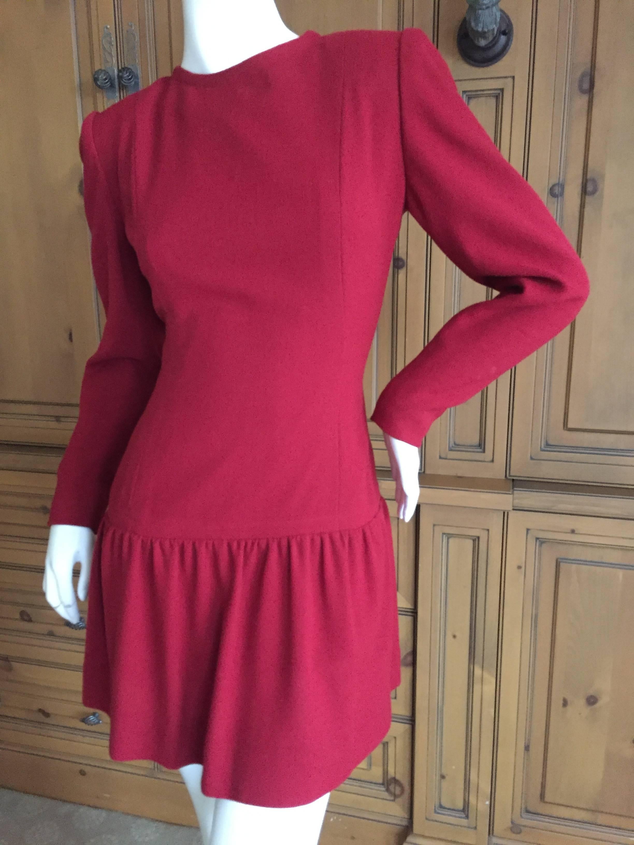Darling red mii dress with skater skirt from Hubert Givenchy. Label reads Givenchy Couture.
Woo, fully  lined
Bust 38