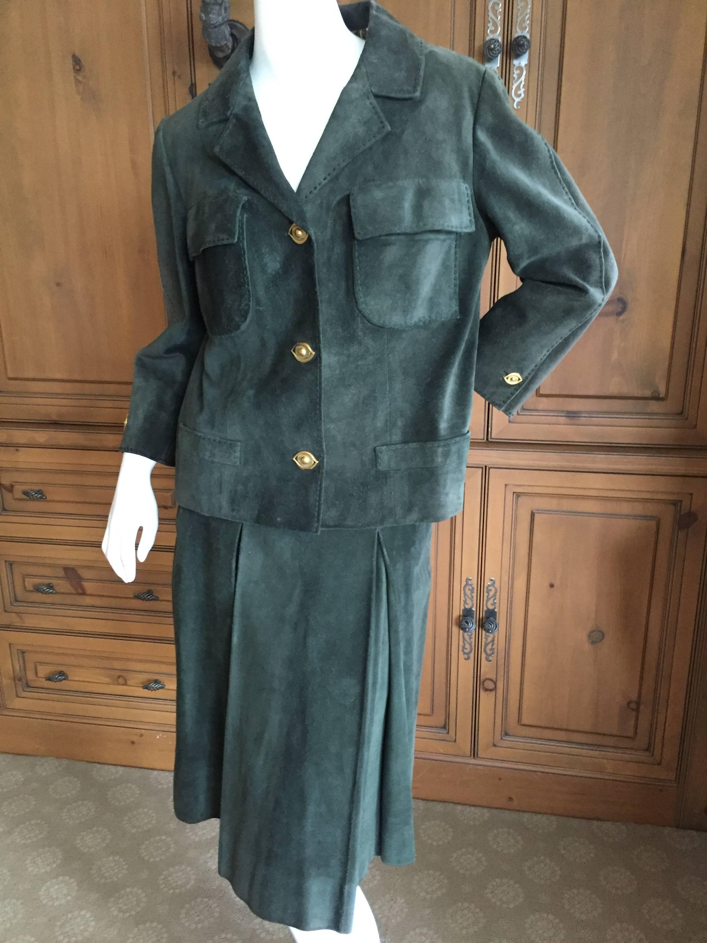 Gorgeous green suede skirt suit from Hermes circa 1966.
Beautifully accented with top stitching.
This is a really special vintage suit. Unusual 