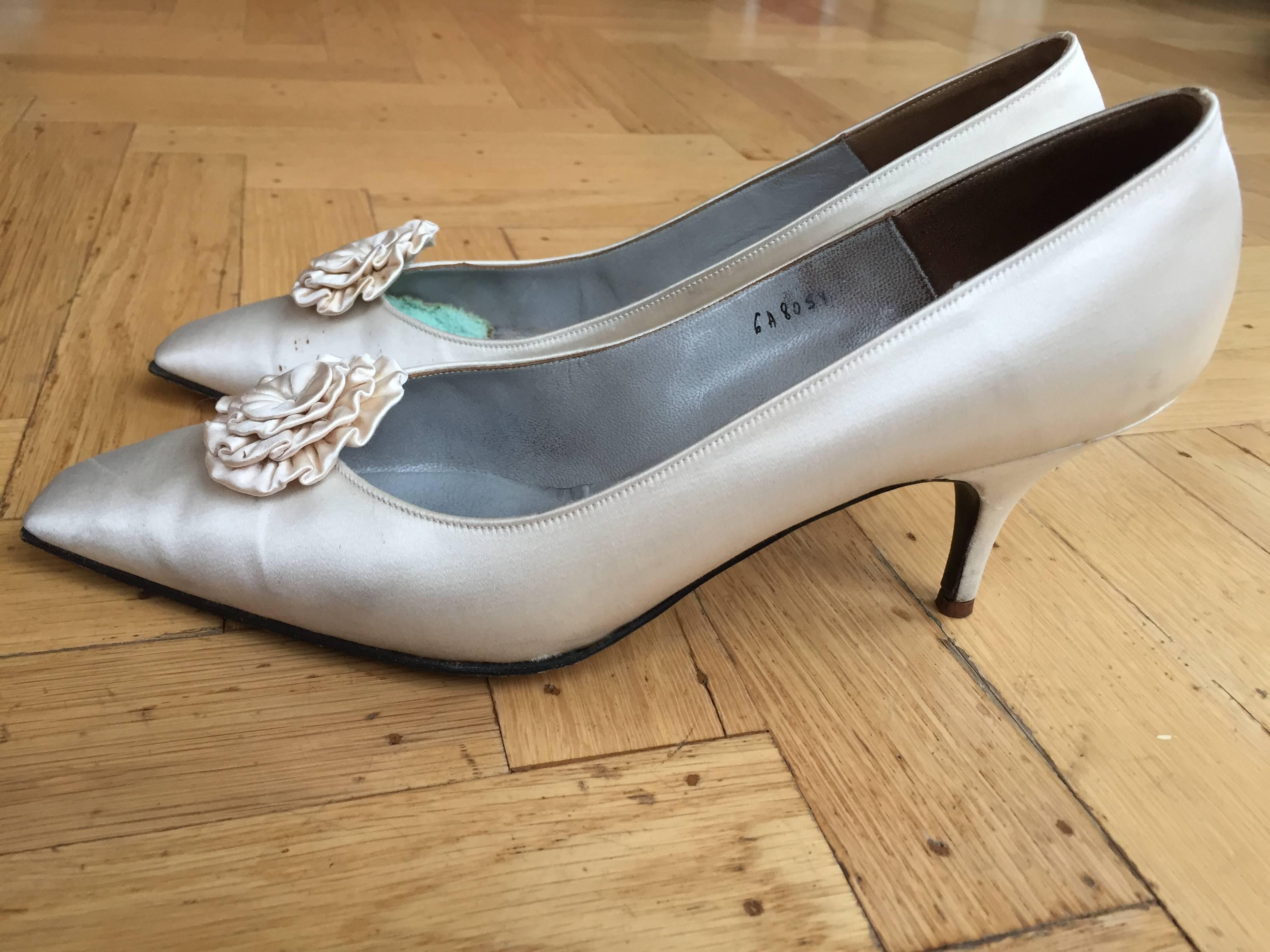 Ivory Silk pumps with rosette on pumps from Christian Dior by Roger VIvier circa 1958.
Made to measure for Eleanor.
She wore size 6 and 6 1/2
From the collection of Eleanor Louise Christenson de Guigné.
Eleanor de Guigné was one of the most