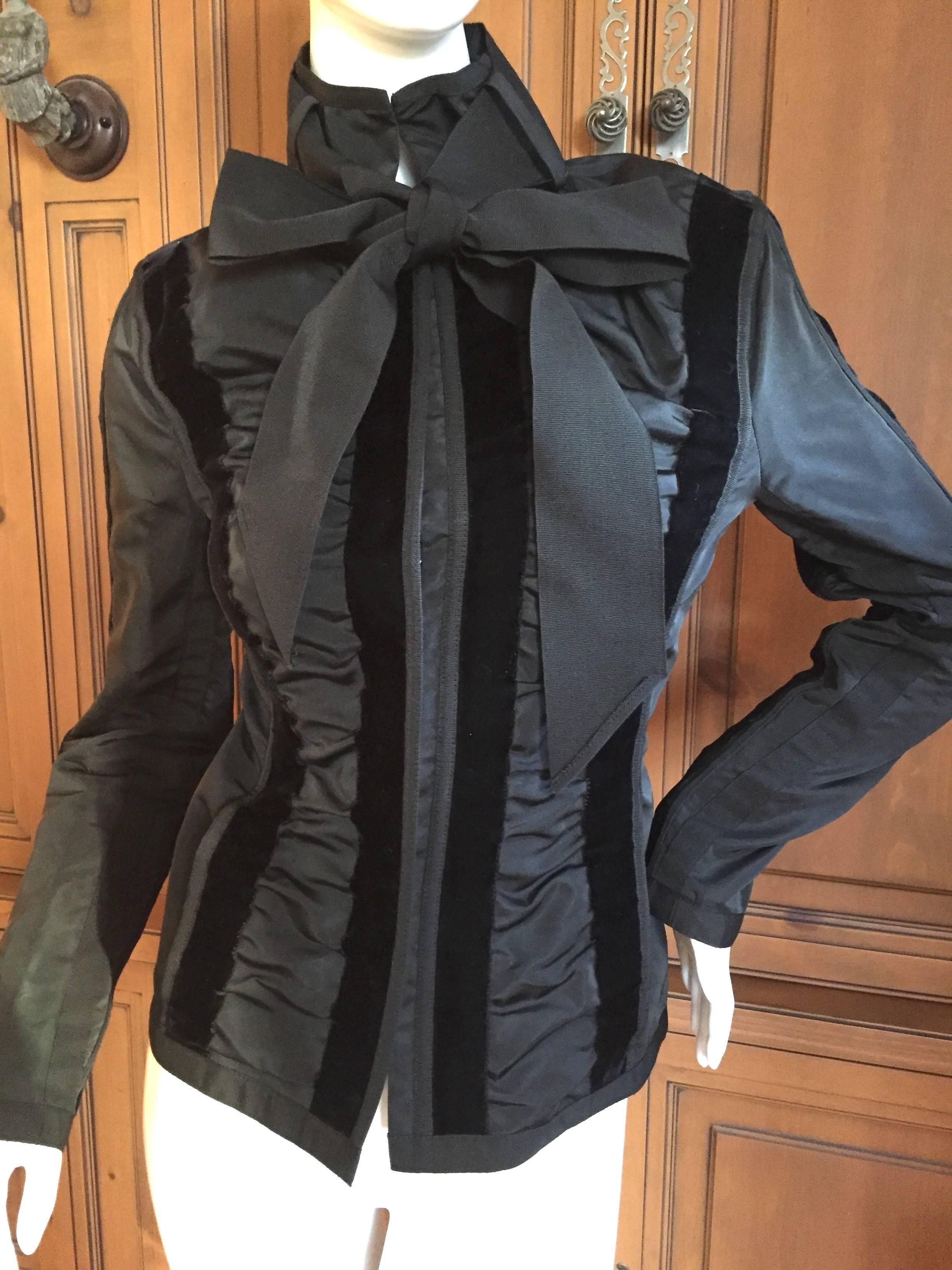 Tom Ford for YSL Black Jacket. Look one from 2002 Fall Yves Saint Laurent. Ruched panels alternating with velvet bands.
Size 34
Bust 34"
Waist 28"
Length 24"
Excellent condition