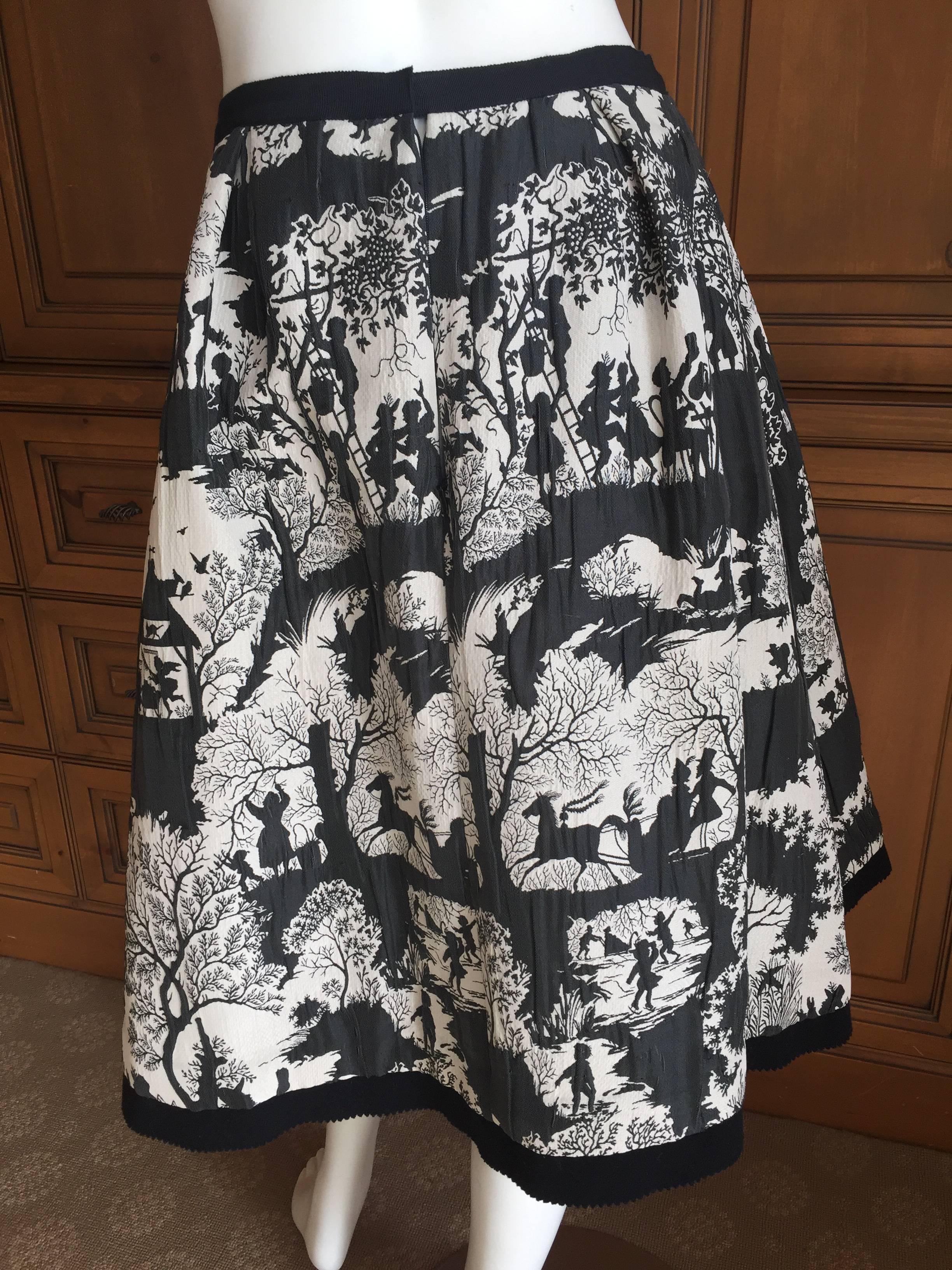 Wonderful black and gray Toile pattern skirt from Oscar de la Renta .
This was created for the Fall 2013 collection, when John Galliano was brought in as a creative consultant. 
Size 6