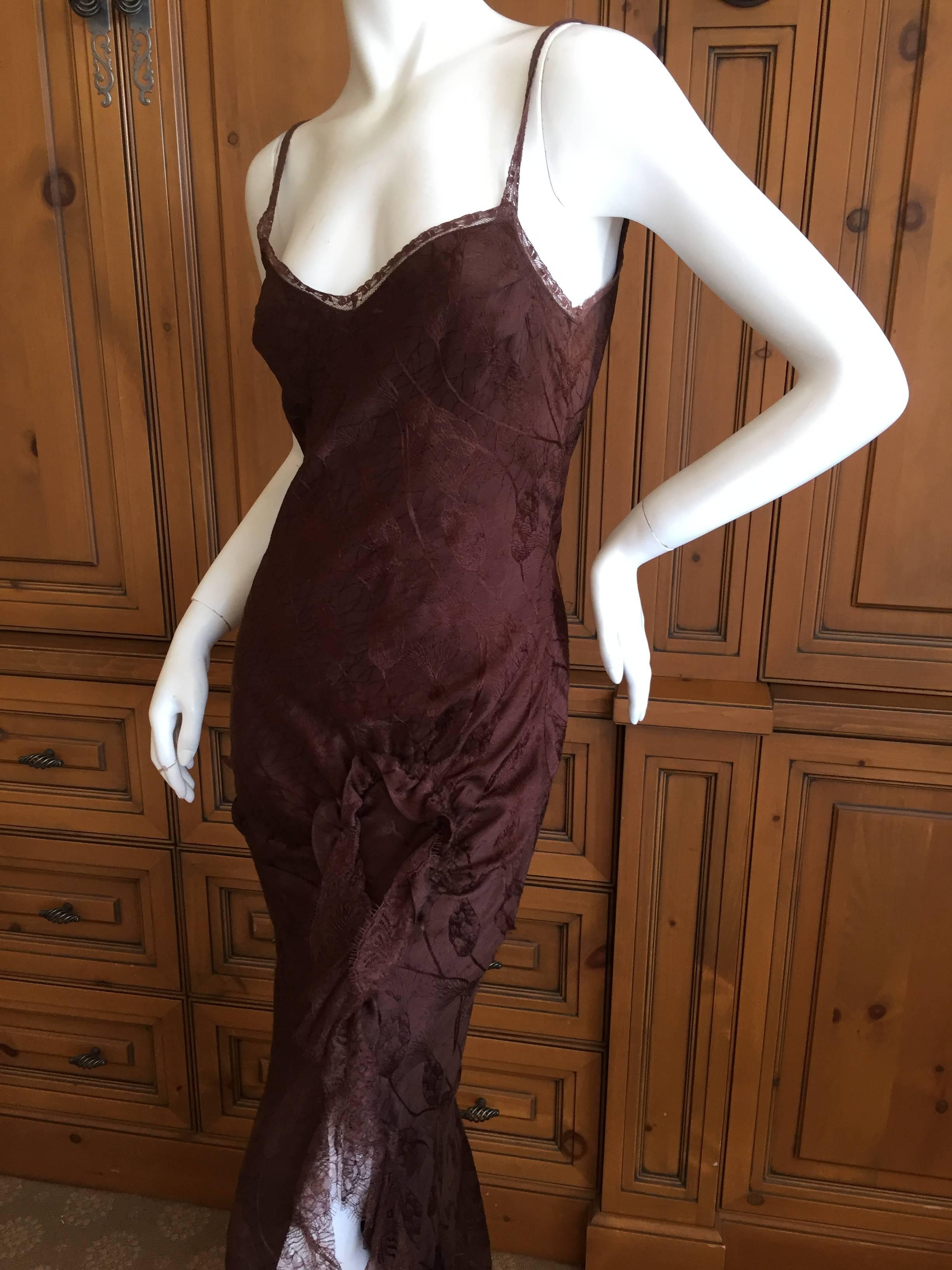 

John Galliano Romantic Botanic Pattern Brown Silk Bias Cut Dress with Lace Details.

Size 4 

Bust 36