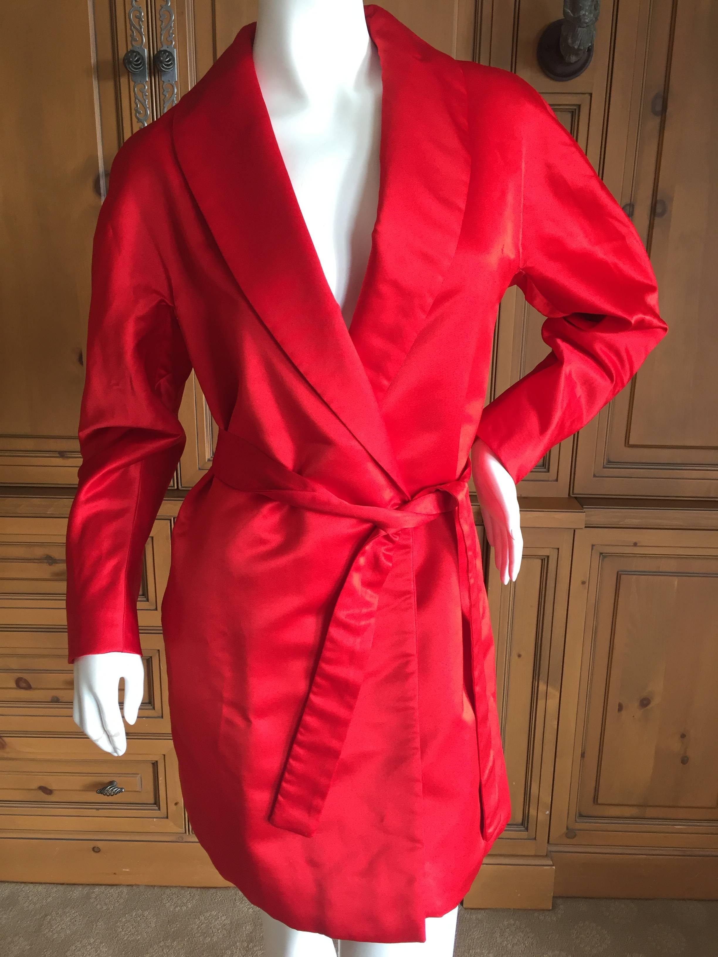 Halston Vintage Seventies Silk Faille Evening Coat.
Rich saturated red ,  with belt, this is the perfect eye popping evening coat from the master of simplicity, Halston.
Bust 40