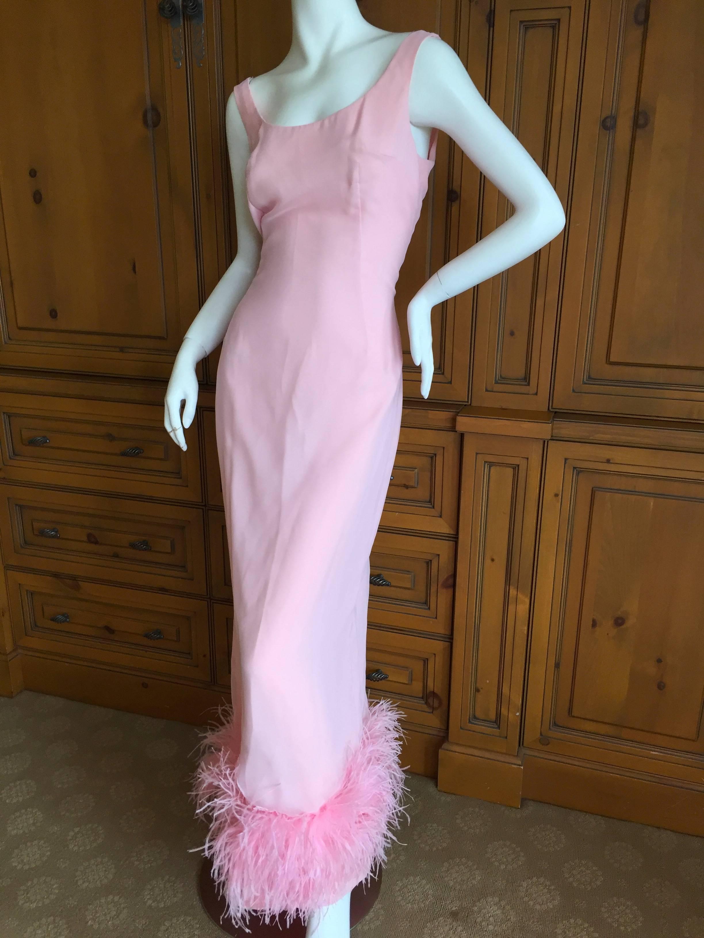 Jean Louis Couture two layer pink chiffon dress with maribou feather trim.
Sleeveless feather trim dress and matching caftan outer layer.
Jean Louis was a Hollywood designer in the 50's , 60's and early 70's.
This is such a great piece, so very