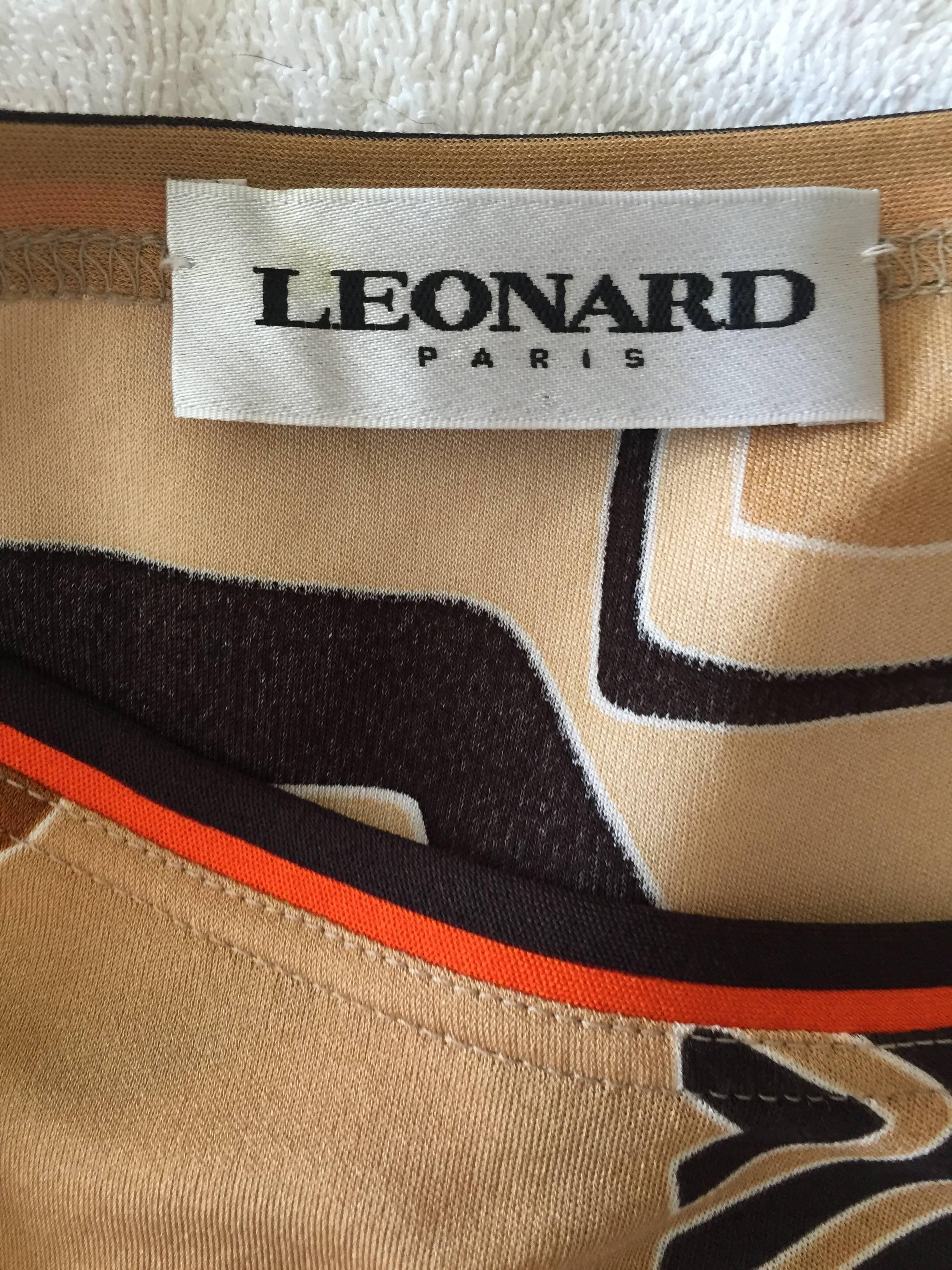 Leonard Paris 1960's Pattern Silk Jersey Mini Dress with Belt.
Size 38
Bust 40